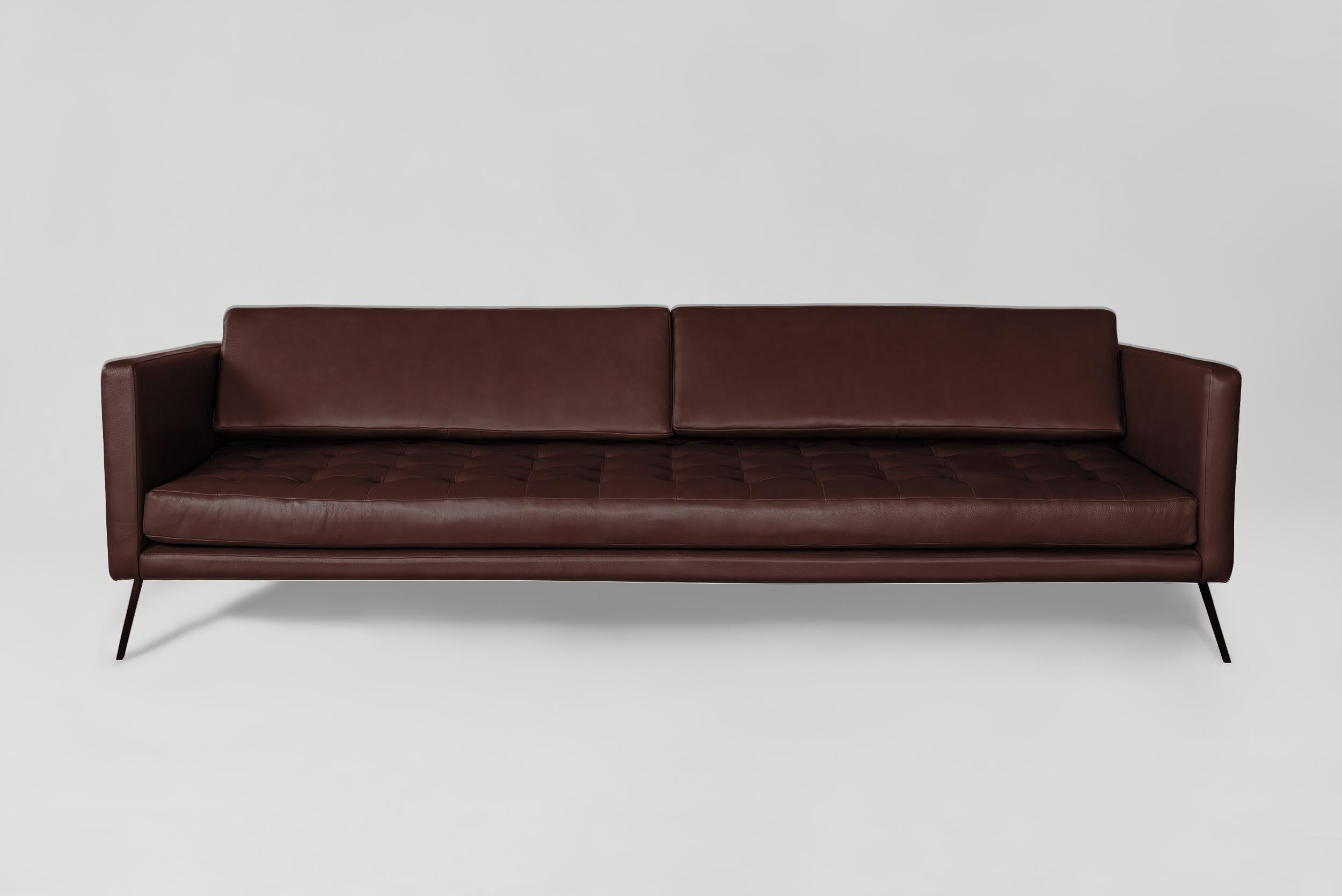 The Mantis sofa Tuffed Fabric Upholstery and steel legs

L 240.0cm/94.4”
W 92.0cm/36.2”
H 74.0cm/29.1”
Seat height 42.0cm/16.5”

Also available in fabric. Price quoted for Grade in Fabric version.