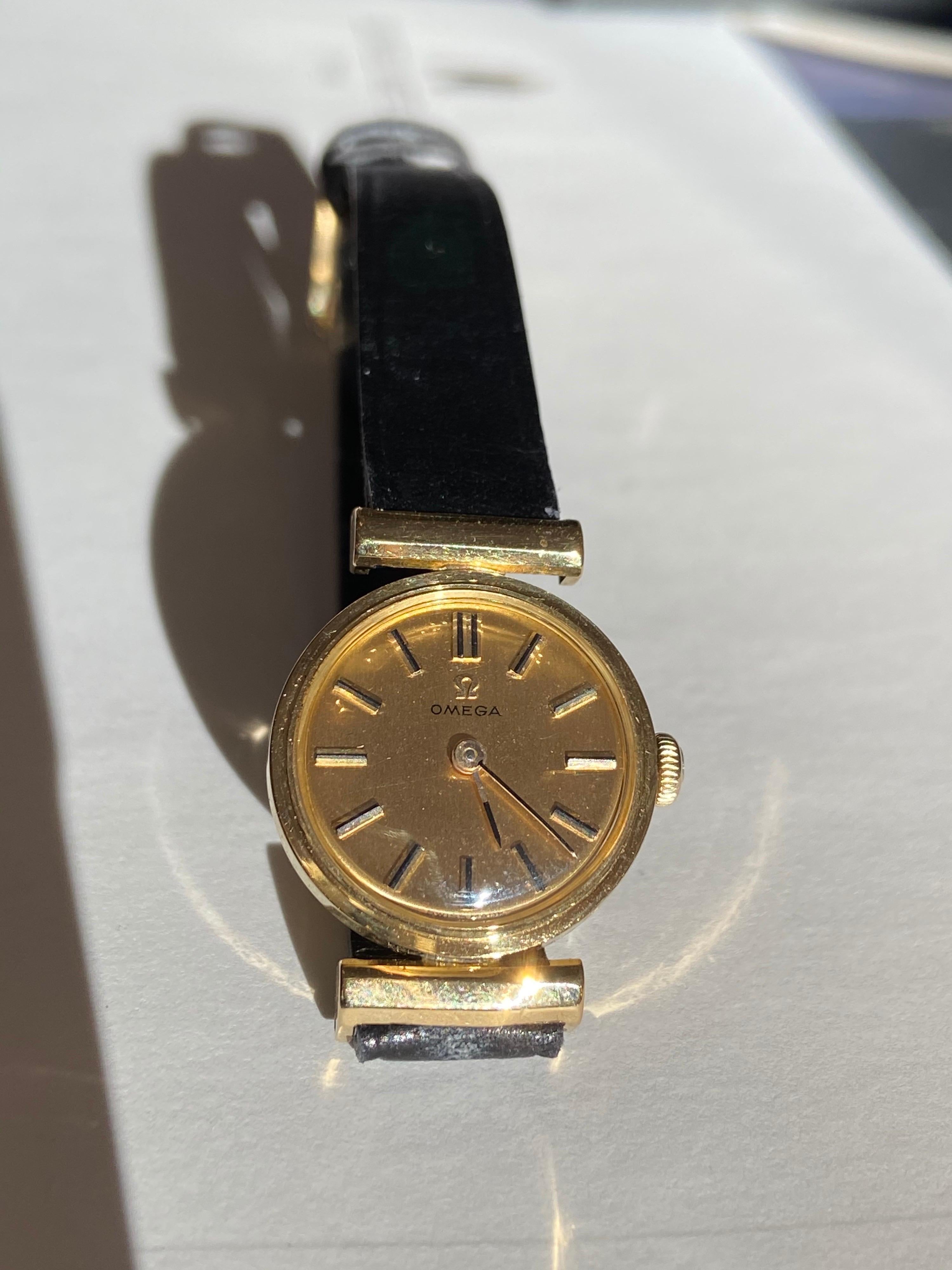 Mid-Century Modern Manual Ladies Omega Gold Watch, circa 1960, Swiss Made, Valuated