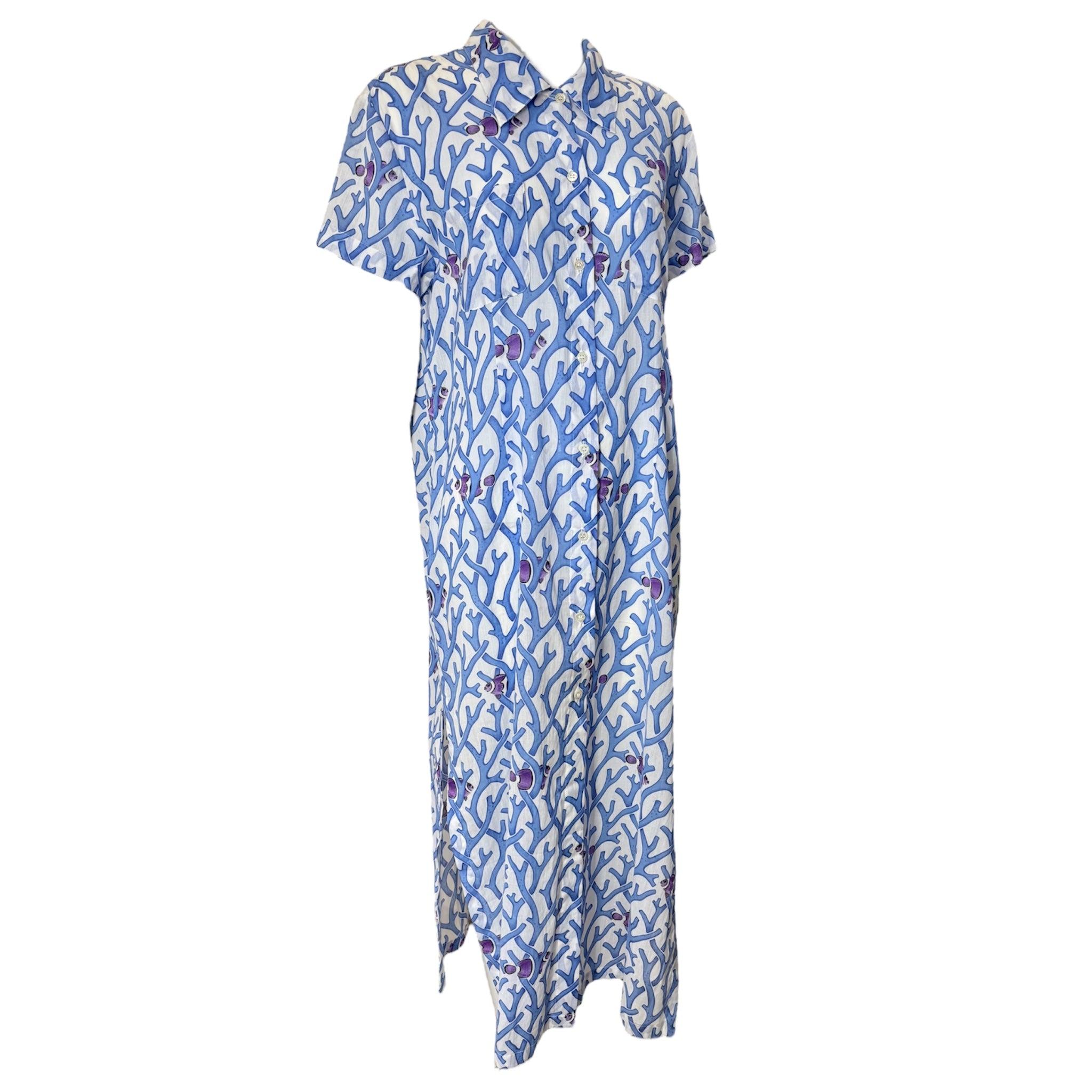 Vestido Manuel Canovas con estampado de coral azul playa. Algodón ligero perfecto para tu próxima escapada a la playa. Ideal para cubrirte o arreglarte para un brunch al sol. Vestido camisero abotonado de silueta recta. Bonito pez payaso púrpura