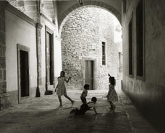 Vintage Manuel Carrillo, Untitled, Mexico. C. 1960-70s. (kids playing in archway)