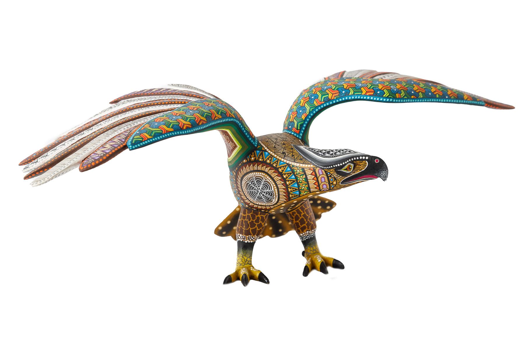 Aguila - Eagle Alebrije
This Mexican Aguila - Eagle Alebrije made with Copal wood, wood carving technique gouges, machete and sandpaper, decorated with acrylic paintings with Zapotec symbols.
At Cactus Fine Art, we offer an exclusive selection of