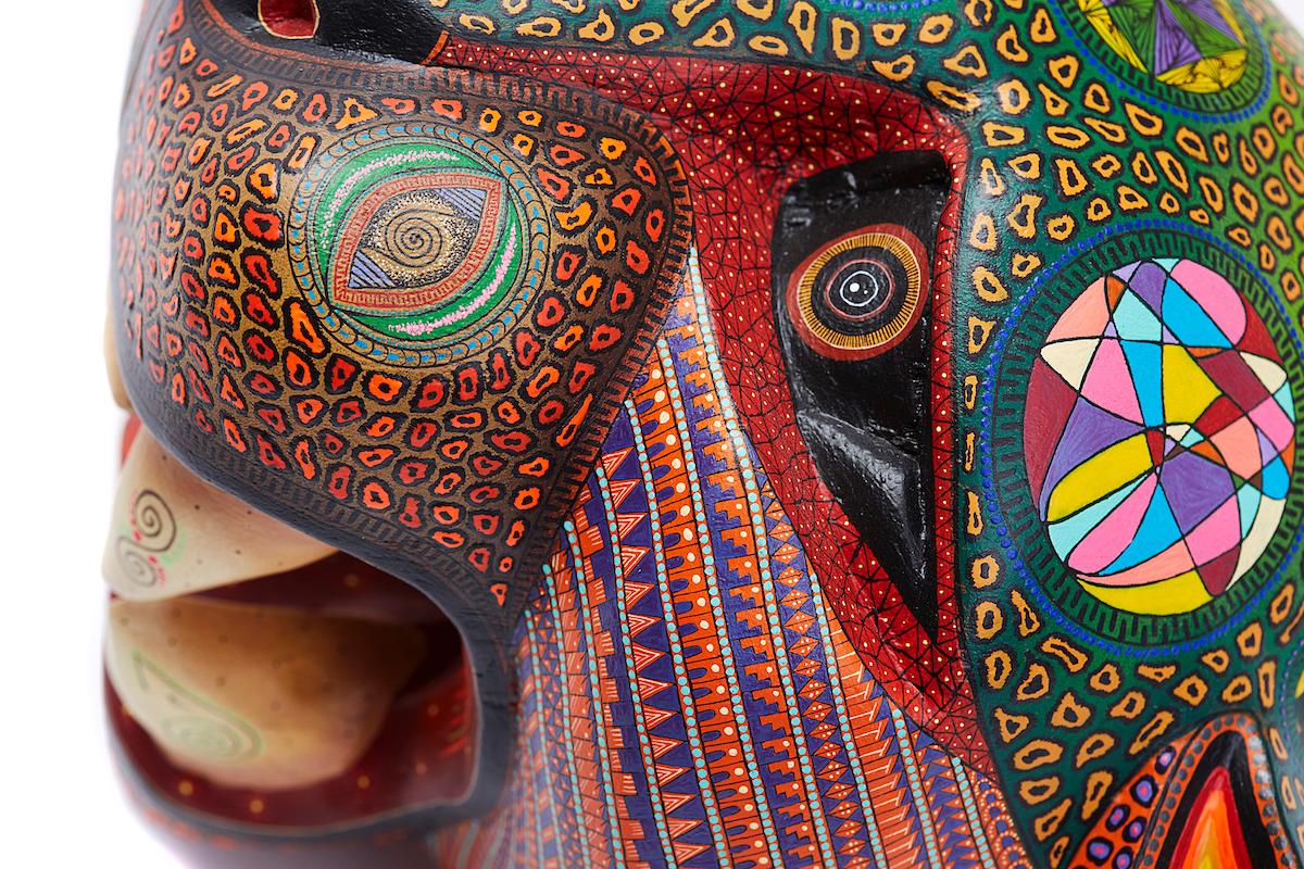 This Mexican Jaguar Mask was made with Copal wood, wood carving technique gouges, machete and sandpaper, decorated with natural dyes and acrylic paintings with Zapotec symbols.
At Cactus Fine Art, we offer an exclusive selection of handmade items