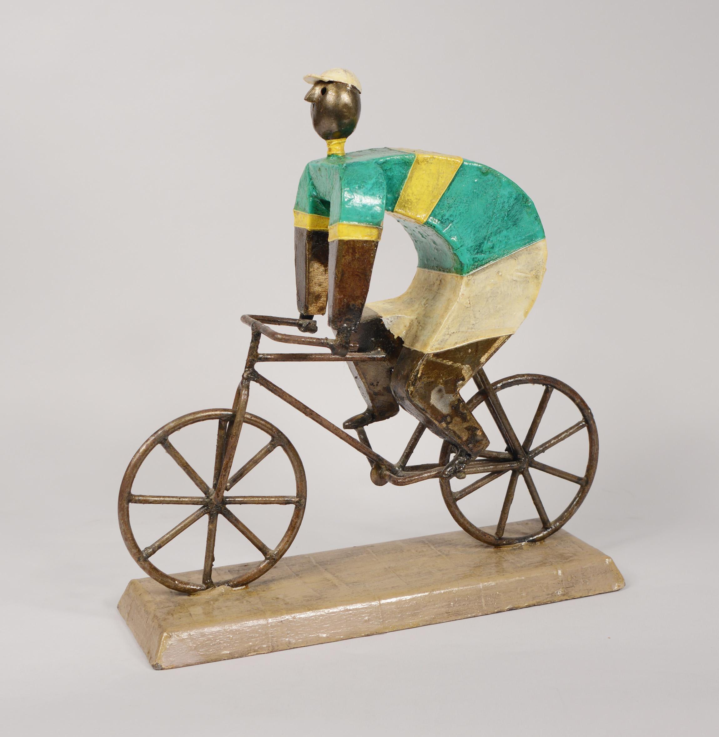 Modernist bicyclist sculpture by Manuel Felguerez. Felguerez designed a number of animal and people sculptures in 1964. The bicyclist is one of the stronger designs. They are made of iron with paper mache.