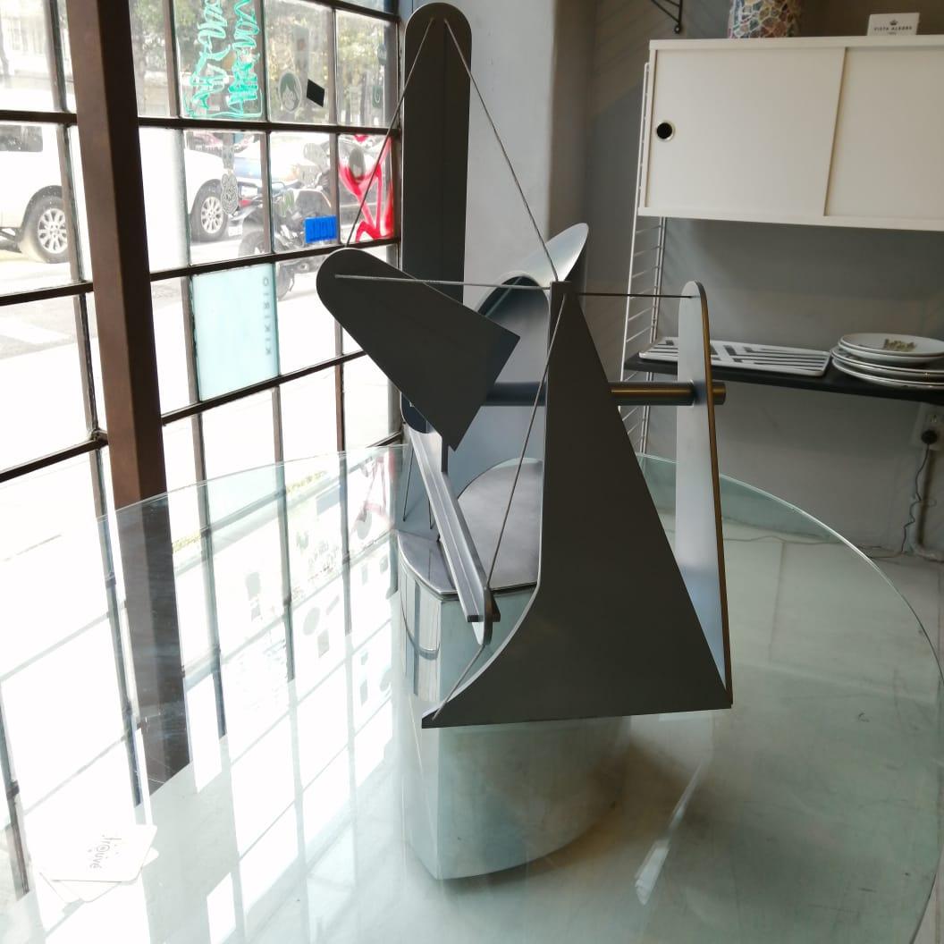 A geometric sculpture by Mexican artist Manuel Felguérez. The steel sculpture is lacquered in grey and joined by wire. No signature on the sculpture. A certificate signed by the artist will be given along the sculpture.

Manuel Felguérez