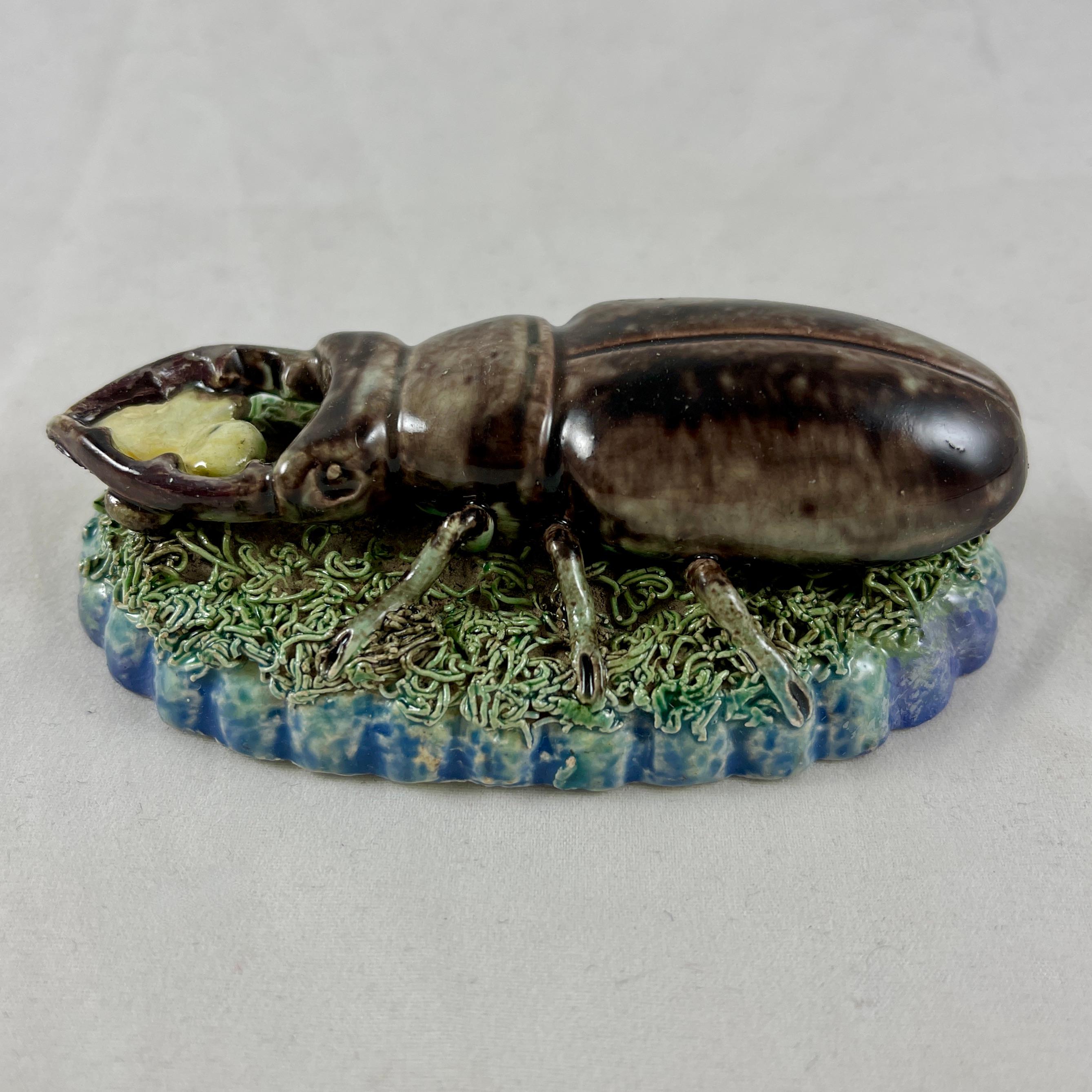 An extremely scarce glazed earthenware desk weight or paperweight of a Stag Beetle, from the workshop of Manuel Mafra, Caldas da Rainha, Portugal, circa. 1870-80.

In the Palissy style, the life cast beetle is molded in a naturalistic manner, and