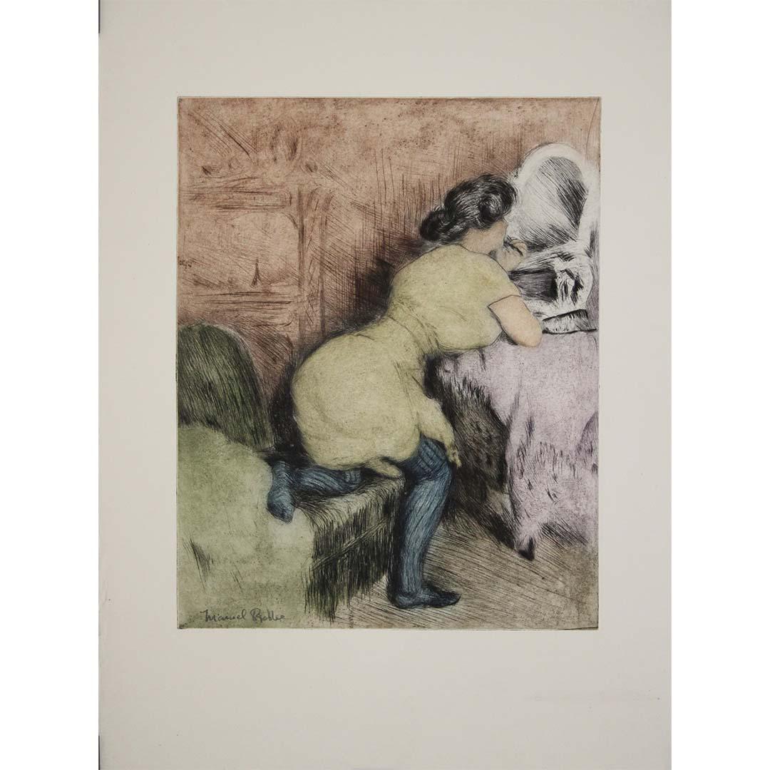 In "Le Maquillage" (1904), French artist Manuel Robbe captures a private, almost voyeuristic moment of everyday beauty—a young woman leaning toward her vanity mirror, lost in the ritual of applying makeup. This intimate scene is rendered in aquatint