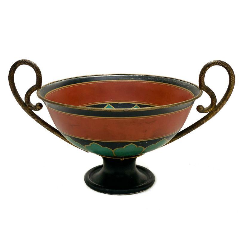 Manufacture De Sevres Etruscan coupe with gilt bronze twin handles, 1848

From a series of Etruscan inspired items that Sevres manufactured starting in the early 1800s. Fine quality gilt bronze mounts to the handles. A rust red and turquoise