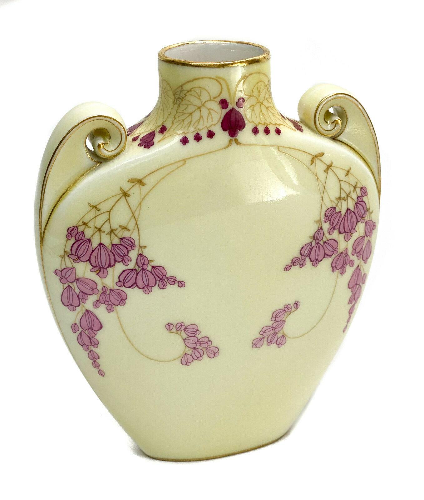 Manufacture de Sevres Porcelain Twin Handled Vase Pink Flowers, 1911

A pale yellow ground with hand painted pink decorations around the center. Manufacture de Sevres mark to the underside with date marks of 1911.

Additional