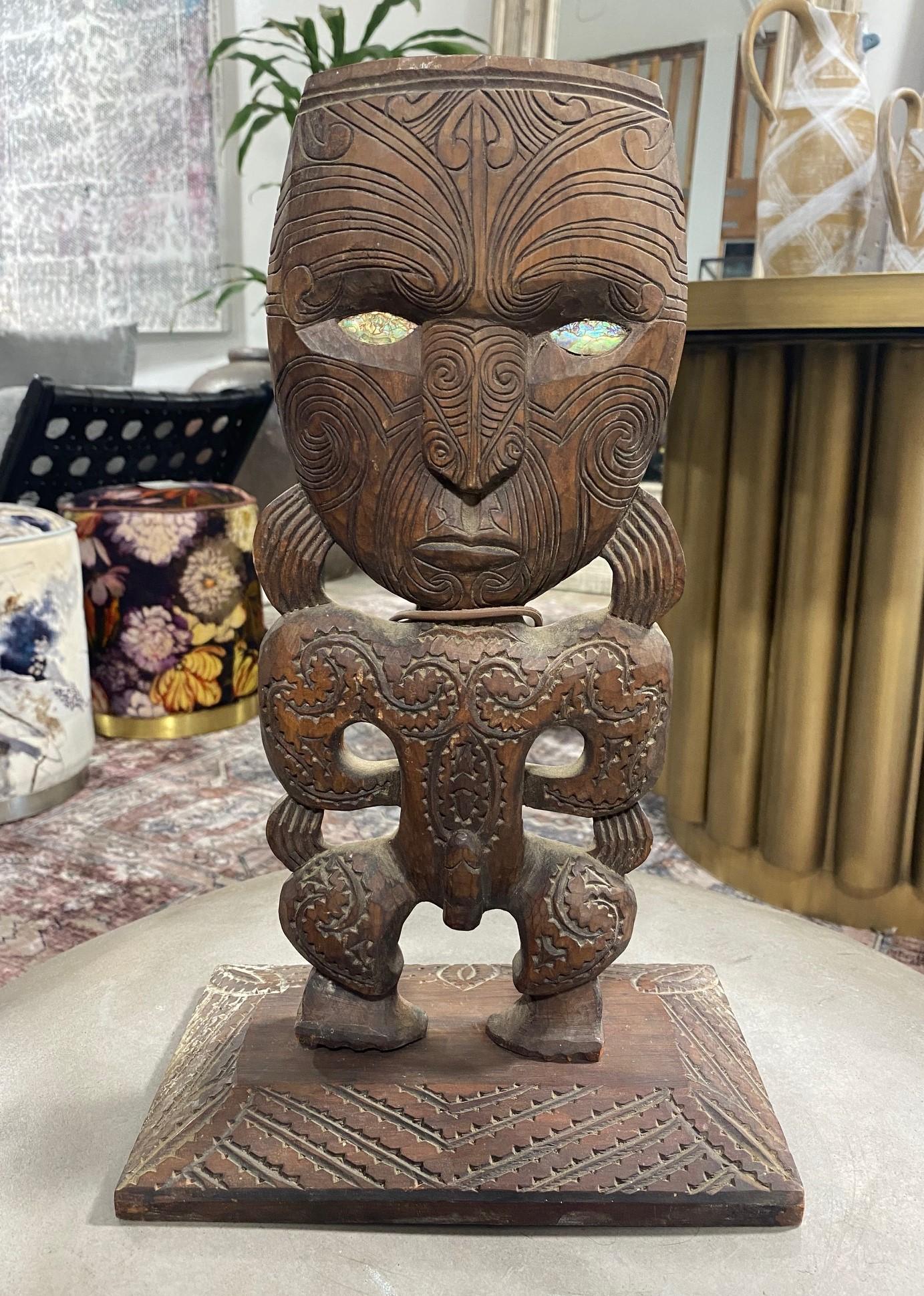 A wonderful and intricately hand-carved wood Maori Tekoteko (Teko Teko) Ancestor Totem figure on a custom stand. Quite mesmerizing and engaging work. Gable Tekoteko figures are often based on founding or prominent ancestor family members - often the