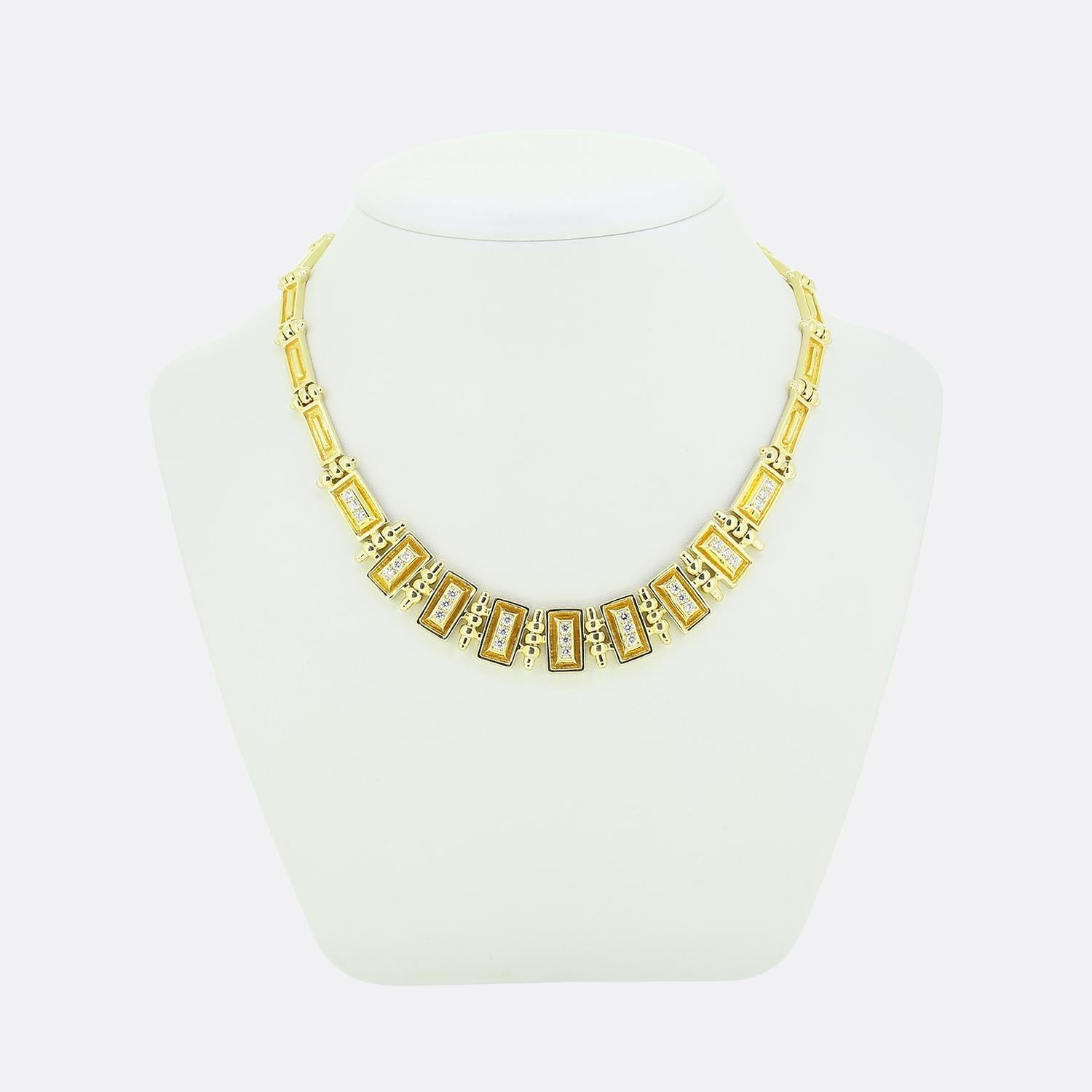Here we have a striking necklace crafted in later stages of the 20th century by renowned Greek jewellery designer, Mapamenos Natepas. This elegant piece has been meticulously fashioned from a rich 18ct yellow gold. The design features a series of