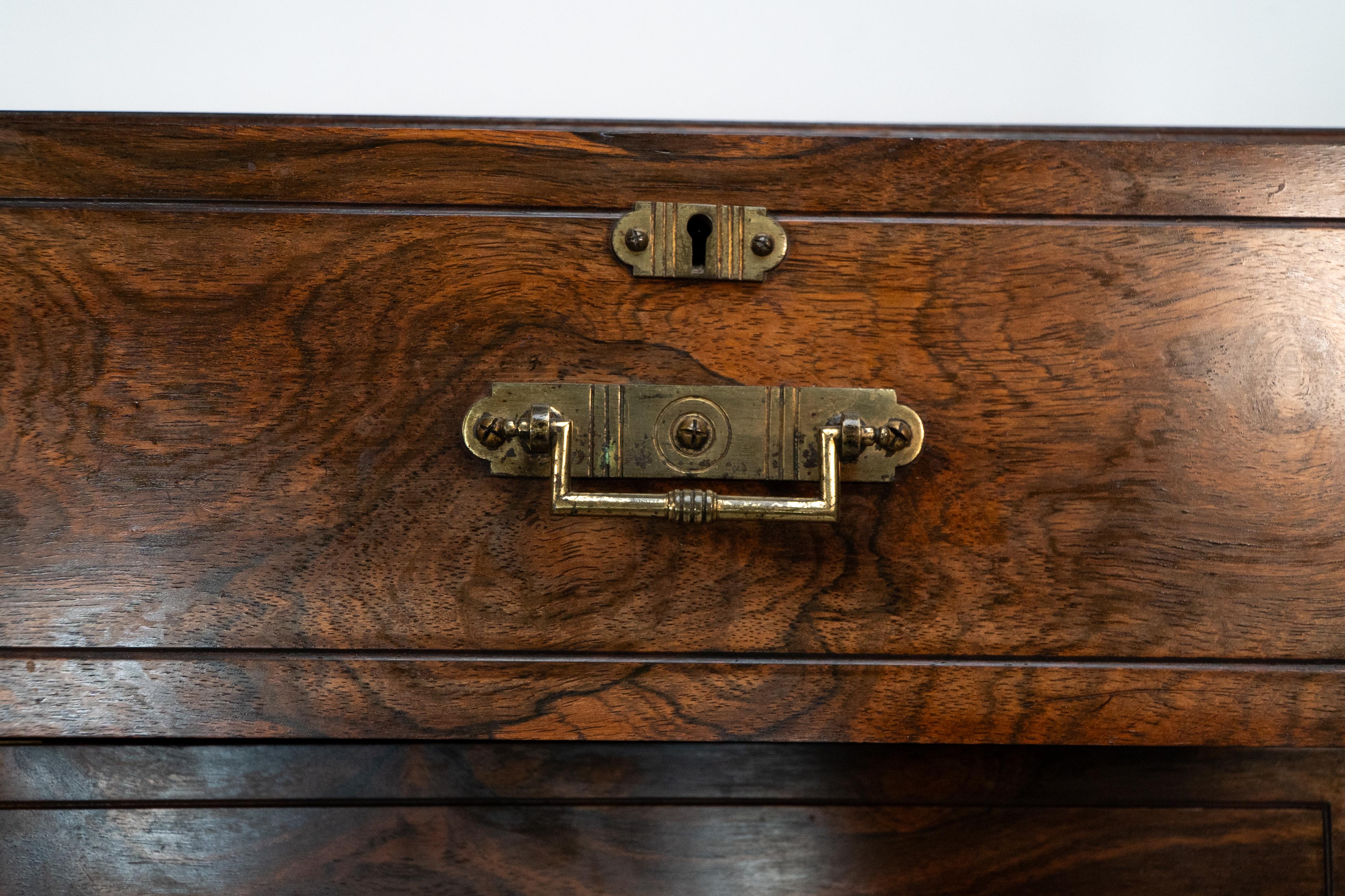 Walnut Maple & Co London Bruce Talbert attr. Aesthetic Movement chest of five drawers. For Sale