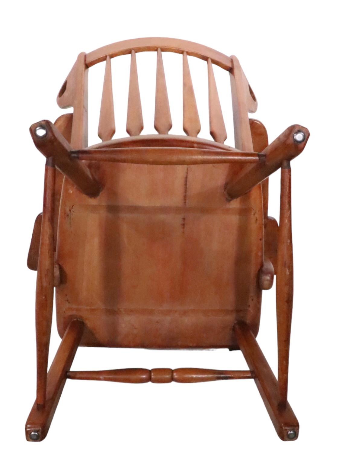 Stylish Rustic  Americana wingback, arrow back,  form lounge chair in solid maple, attributed to Herman de Vries, for Cushman, unsigned. The chair is an example of Modernisms early introduction to mainstream American culture, and was considered very