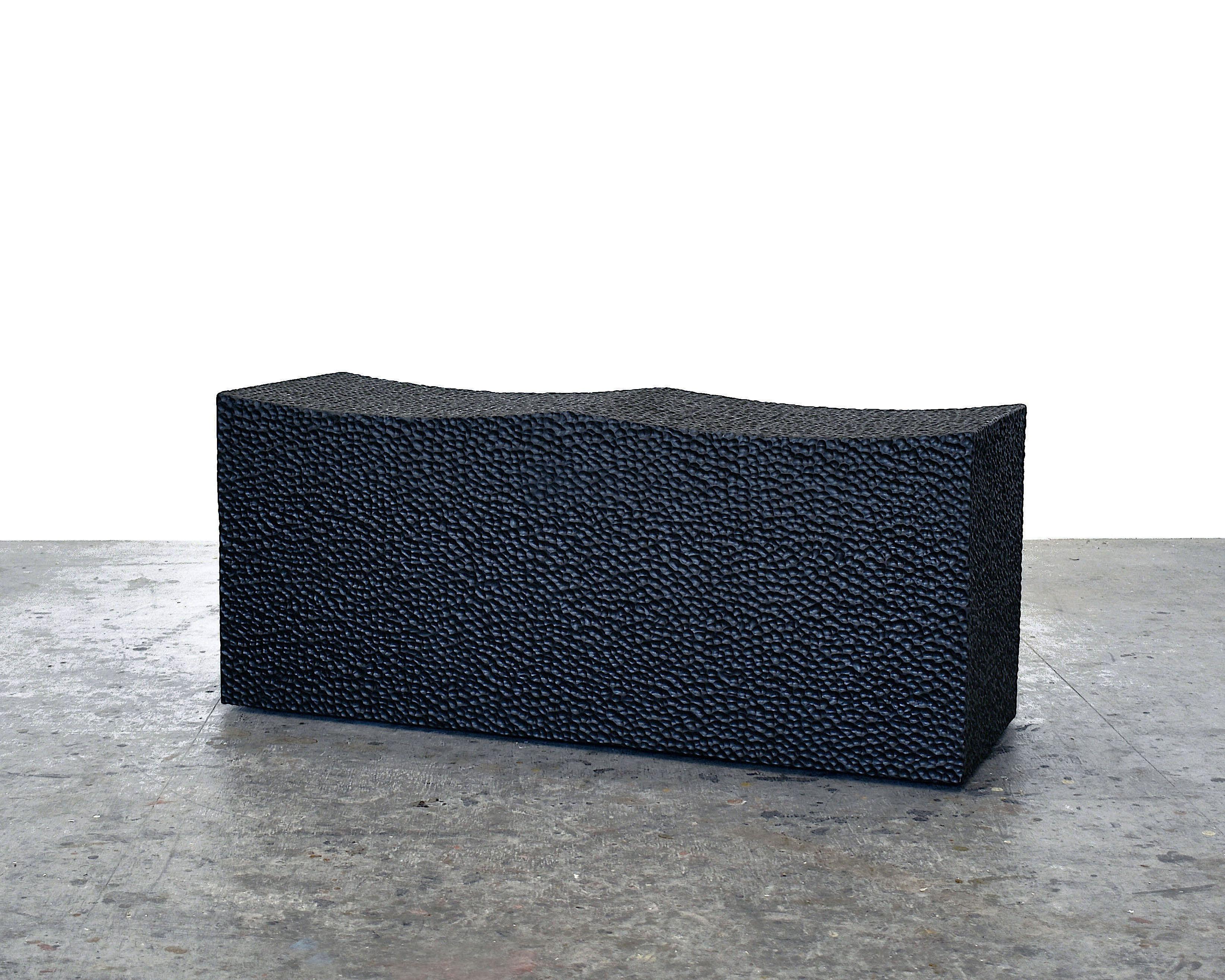 Maple block bench for two by John Eric Byers
Dimensions: 43 x 101.6 x 35.5 cm
Materials: Carved blackened maple

All works are individually handmade to order.

John Eric Byers creates geometrically inspired pieces that are minimal, emotional,