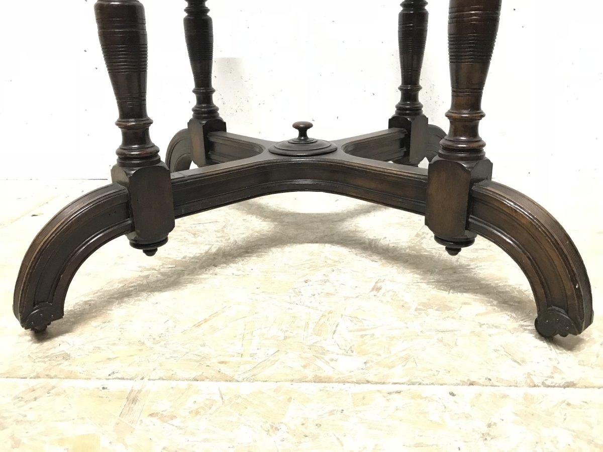 Maple & Co. a Gothic Revival Oak Leather Top Writing Table on Decorative Castors For Sale 7