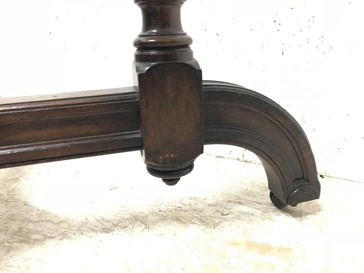 Maple & Co. a Gothic Revival Oak Leather Top Writing Table on Decorative Castors For Sale 12