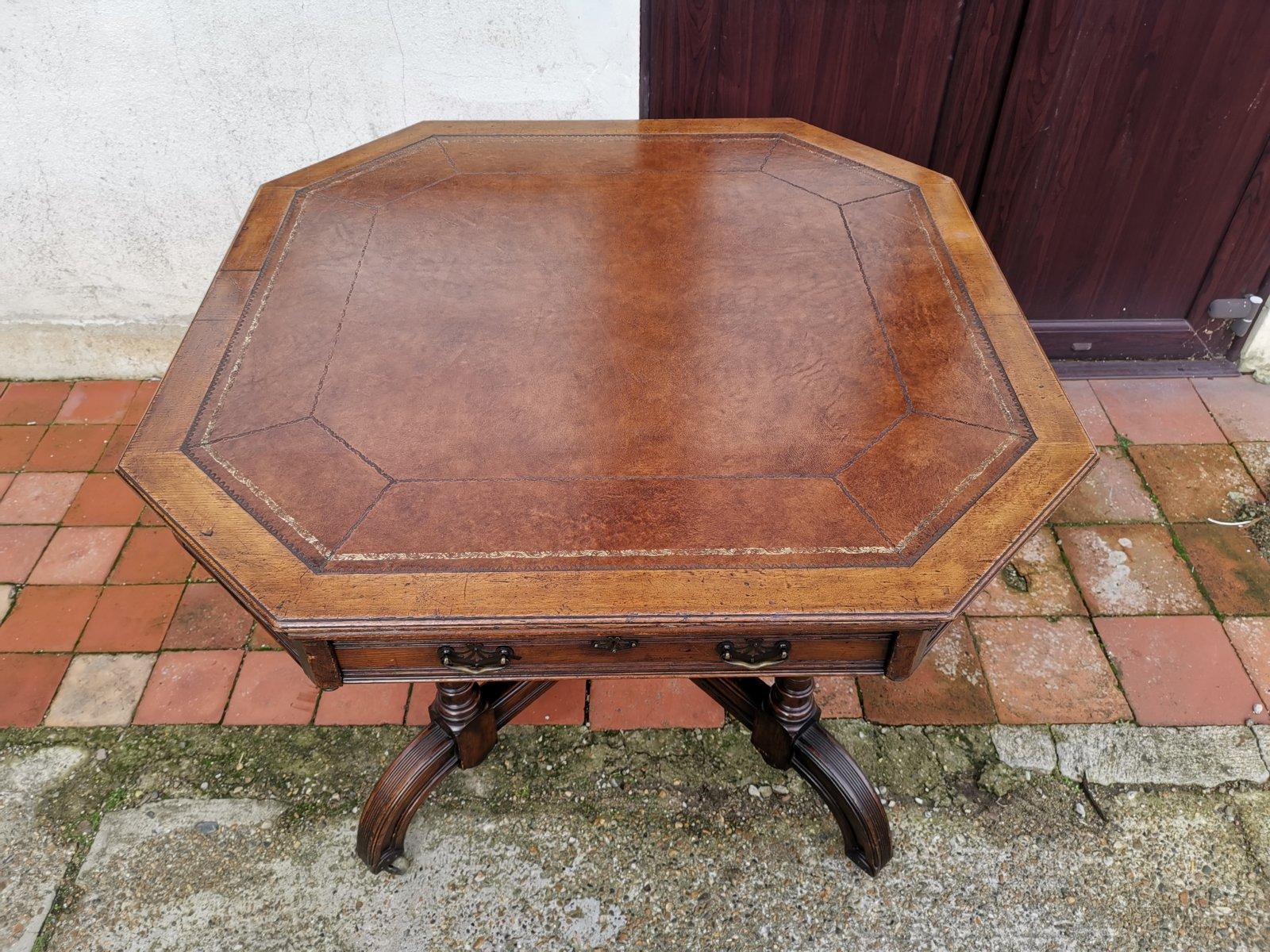 Maple & Co. a Gothic Revival Oak Leather Top Writing Table on Decorative Castors For Sale 1