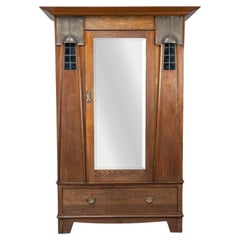 Ahorn & Co. Englischer Arts & Crafts Kleiderschrank aus Eiche mit dekorativen Kupferdetails