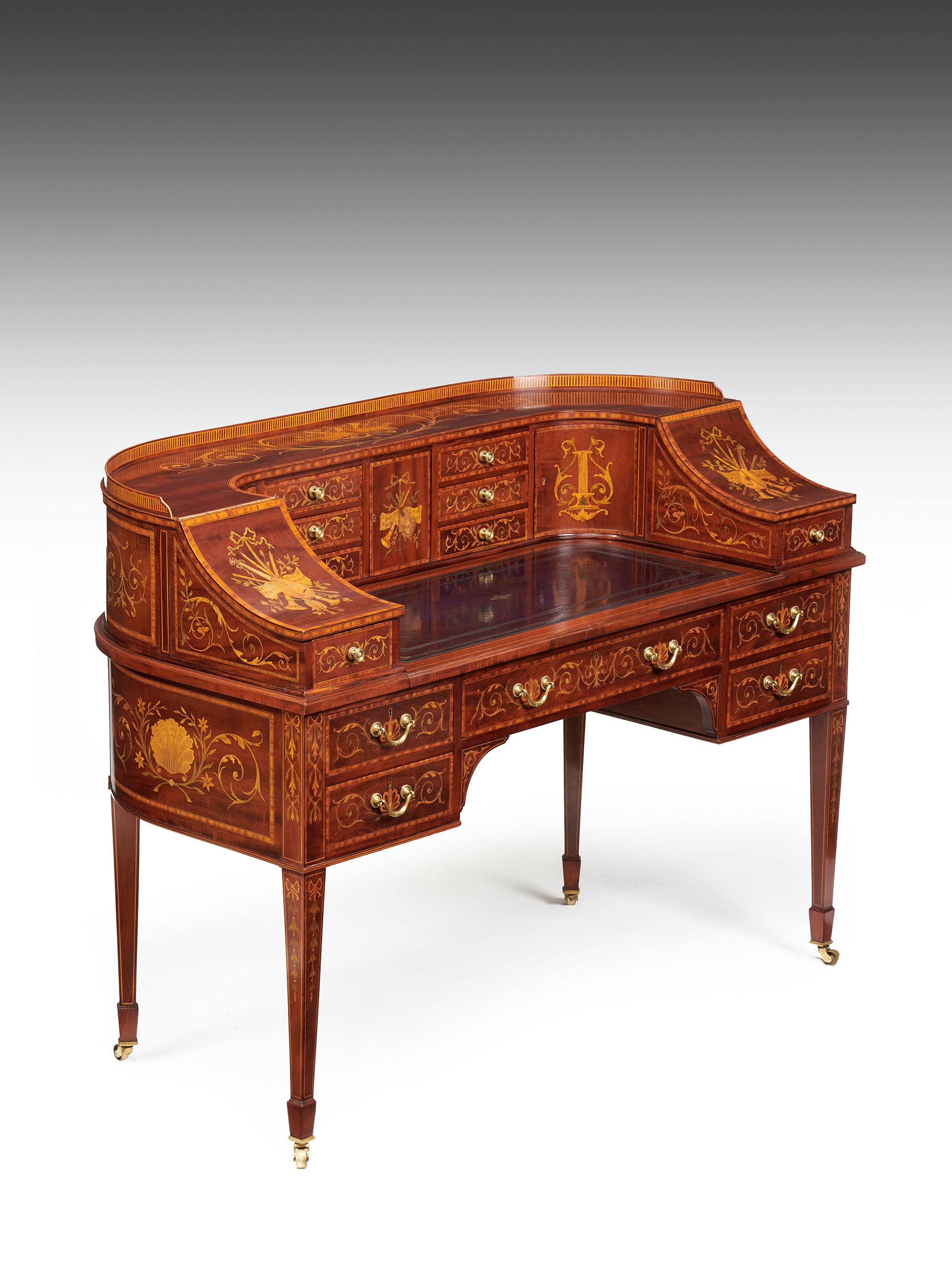 An exhibition quality mahogany, satinwood and marquetry inlaid 19th century Carlton house desk made by the renowned London firm and suppliers to Royalty, Maple & Co. stamped to the central drawer.

English, London made, circa 1880-1900.

Of