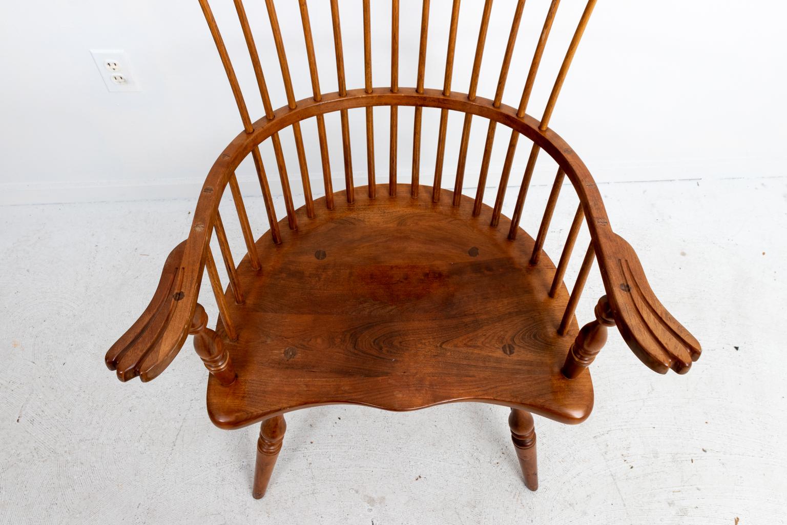Maple comb back Windsor style armchair by Stickley and Company with scrolled ears, circa mid-20th century. Made in the United States. Please note of wear consistent with age including fading on the back.