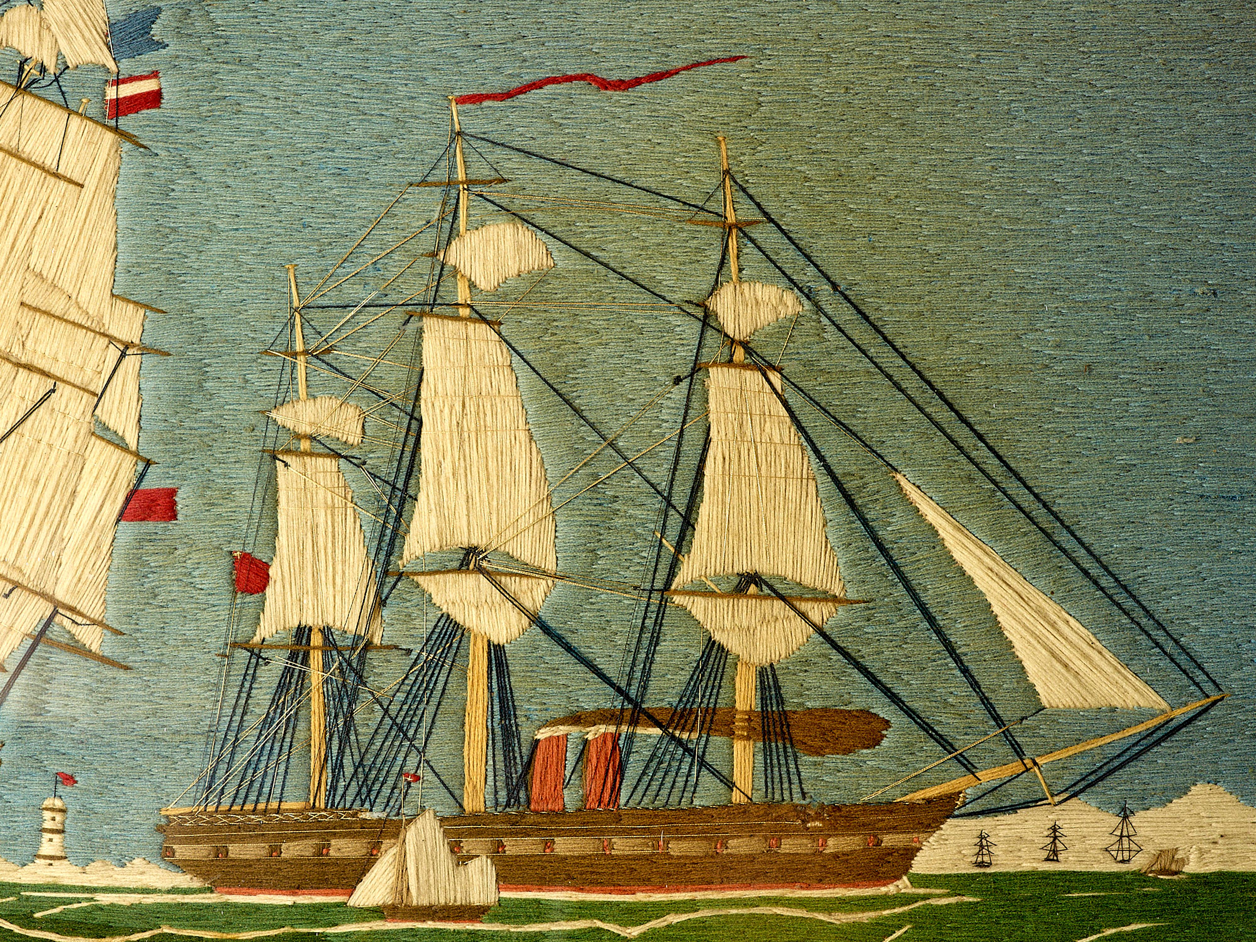 Woolwork ships design
Maple framed woolwork picture depicting a three decker man-o-war and a two-funnelled. With lighthouse and ships in background. Illustrates the transition between sail and steam. Excellent condition with original non-faded