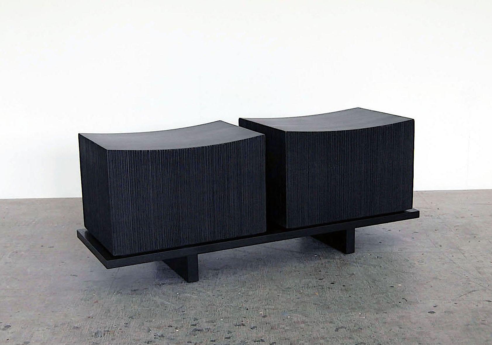 Maple loft bench for two by John Eric Byers
Dimensions: 45.7 x 114.3 x 36.8 cm
Materials: Carved blackened maple

All works are individually handmade to order.

John Eric Byers creates geometrically inspired pieces that are minimal, emotional,