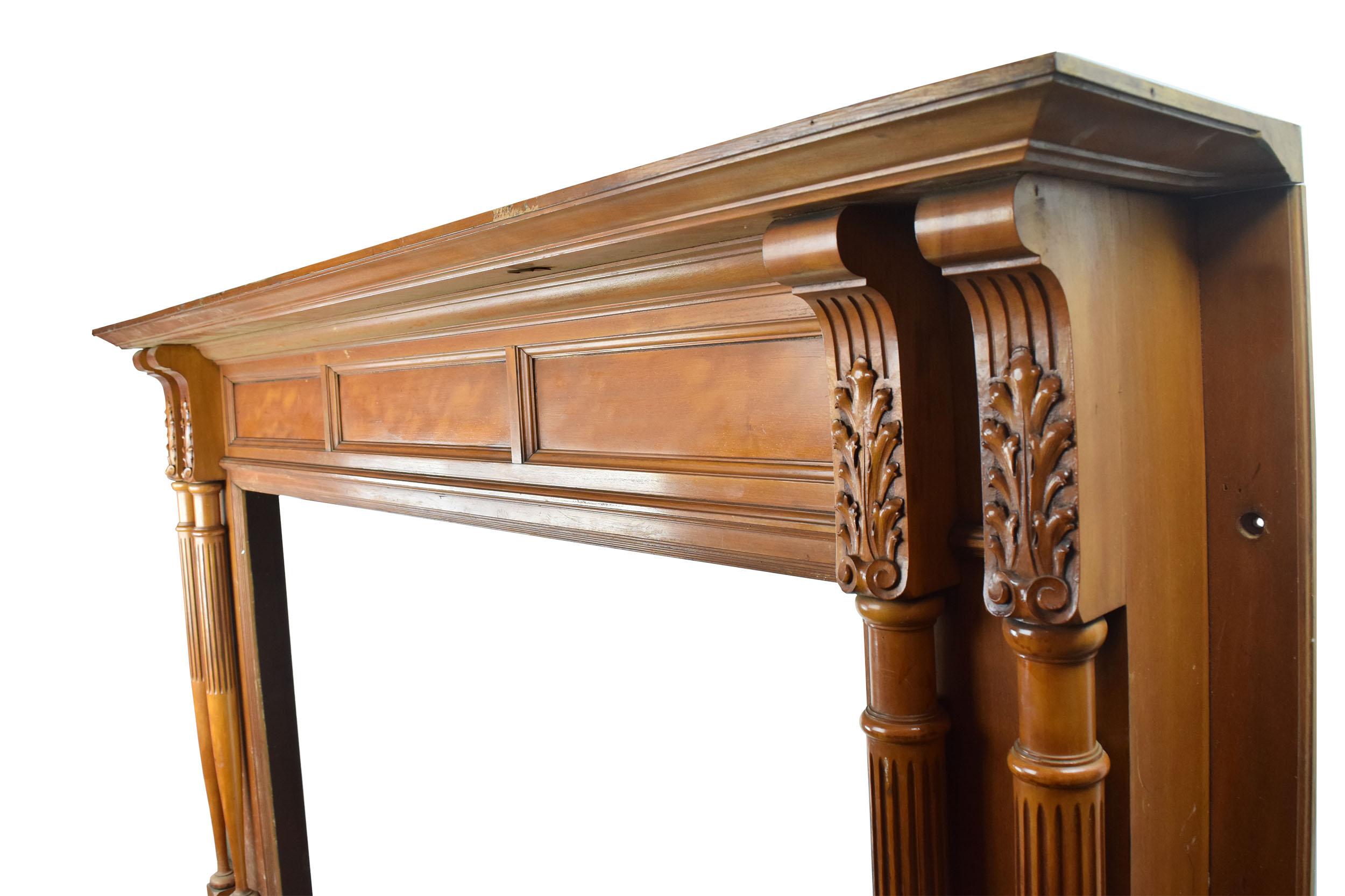 This beautiful half mantel would be a magnificent showcase of a frame surrounding a fireplace. Made out of maple wood, this lovely frame displays exquisitely carved spindles on either side. These leafy designs are very Victorian in style, which