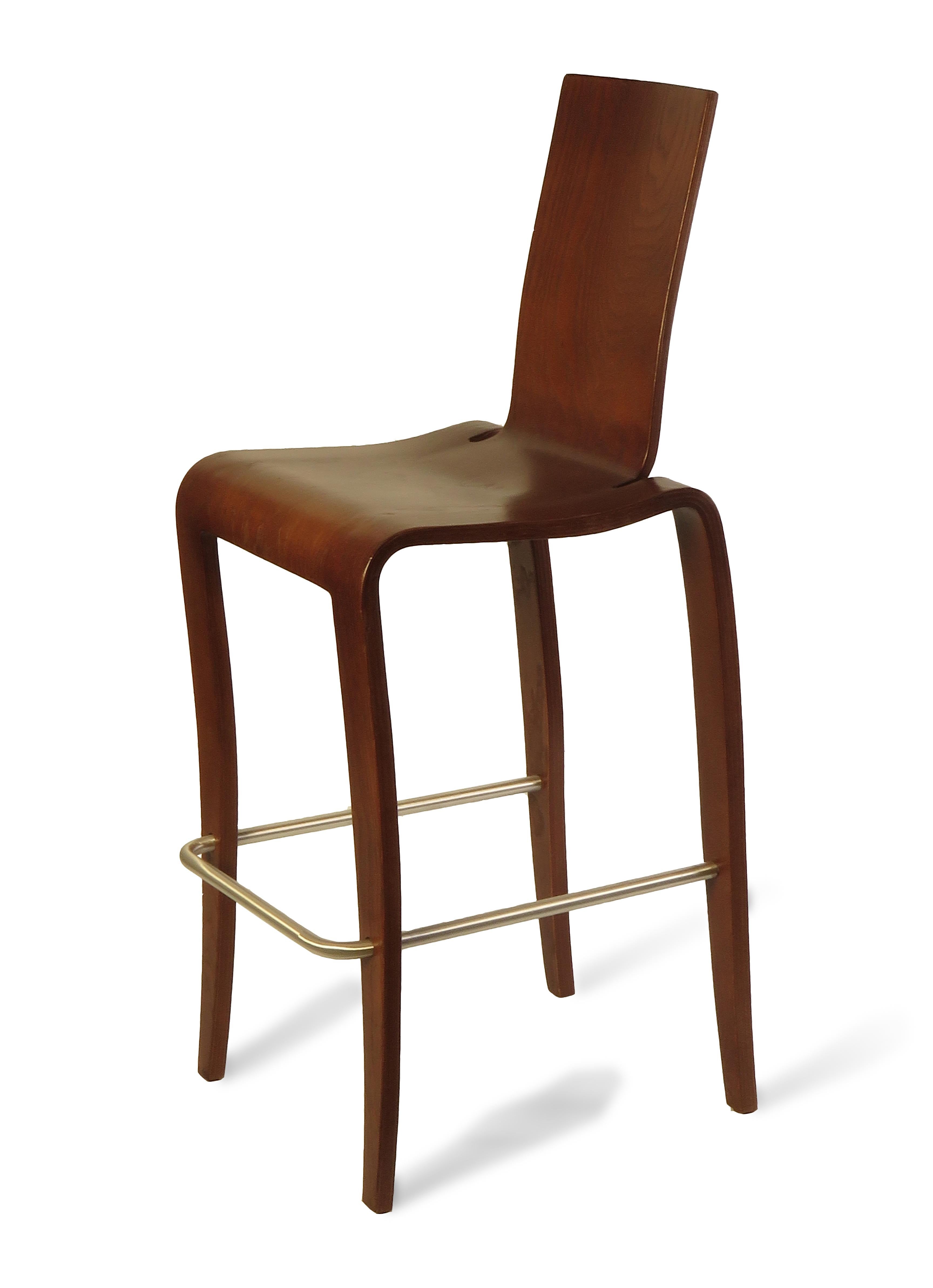 The Europa bar chair is signature Peter Danko aesthetic. The chair is molded to a single piece of maple plywood with maple face veneer, Finished in Walnut and featuring a sleek modern curve, these chairs offer comfort and sway gently with movement.