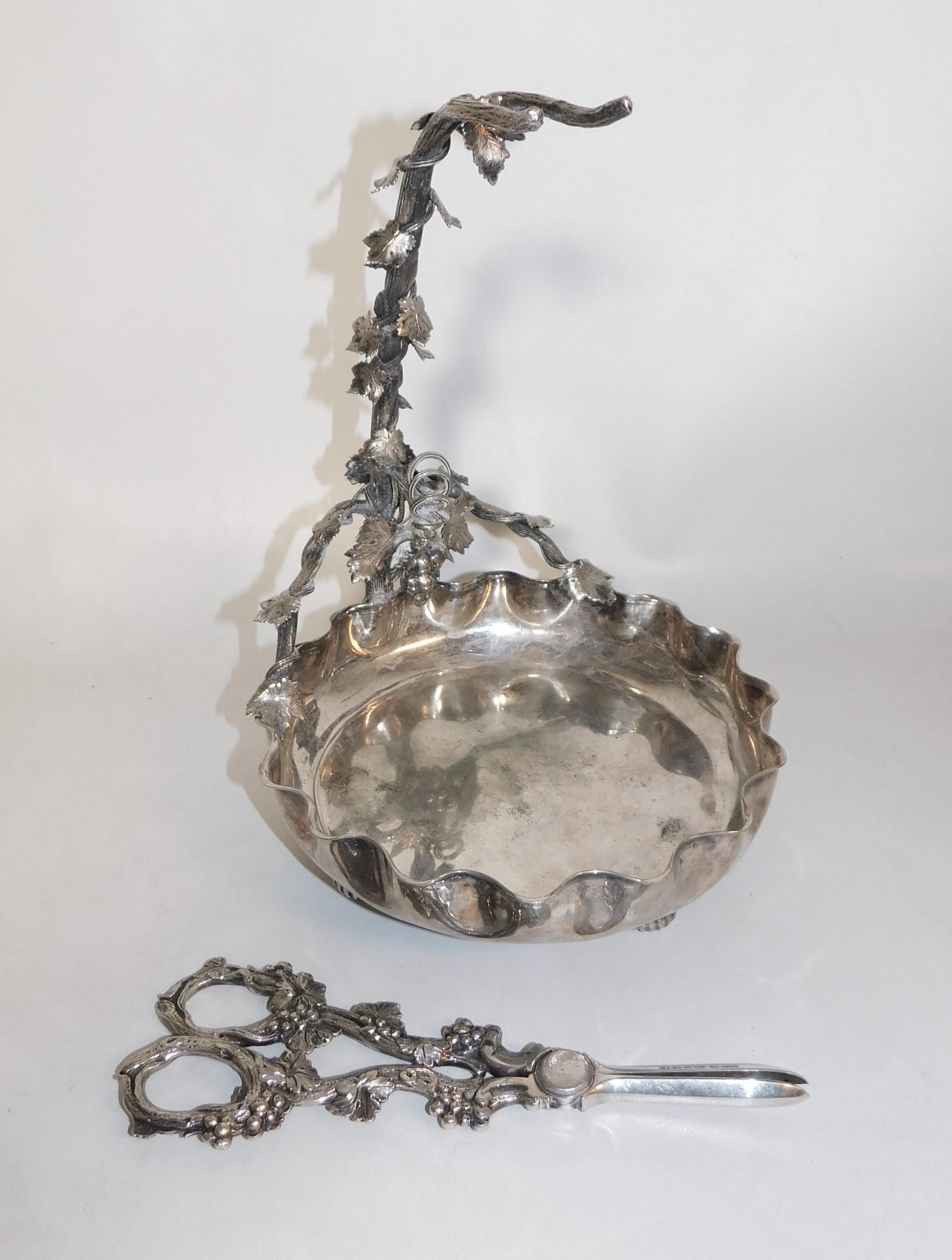 Silver plated Mappin and Webb Princes's plate stand with grape scissor holder on a four footed grape holder base, circa 1890. Shears have a grape and vine design that are marked Mappin Co. S & L (circa 1860).

Mappin & Webb History

Joseph