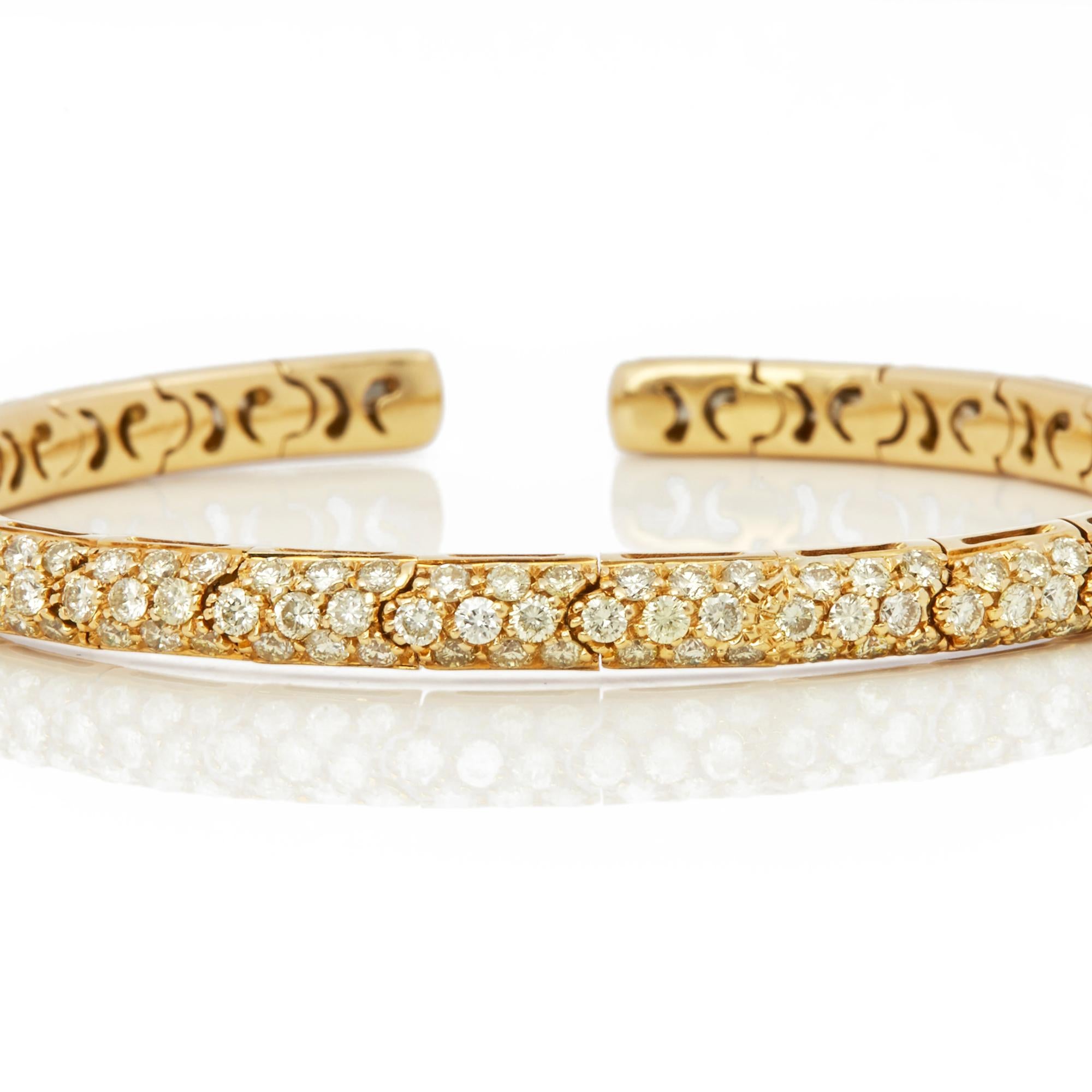Code: J460
Brand: Mappin & Webb
Description: 18k Yellow Gold Fancy Yellow Diamond Cuff Bangle
Accompanied With: Presentation Box
Gender: Ladies
Bracelet Length: Adjustable 
Bracelet Width: 4.5mm
Condition: 9
Material: Yellow Gold
Total Weight: 20.93g