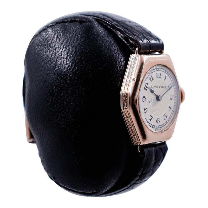 FACTORY / HOUSE: Mappin & Webb
STYLE / REFERENCE: Art Deco Tonneau Shape
METAL / MATERIAL: 9ct Rose Gold 
CIRCA / YEAR: 1922
DIMENSIONS / SIZE:  Length 31mm X Width 23mm
MOVEMENT / CALIBER: Manual Winding / 15 Jewels 
DIAL / HANDS: Original Sterling