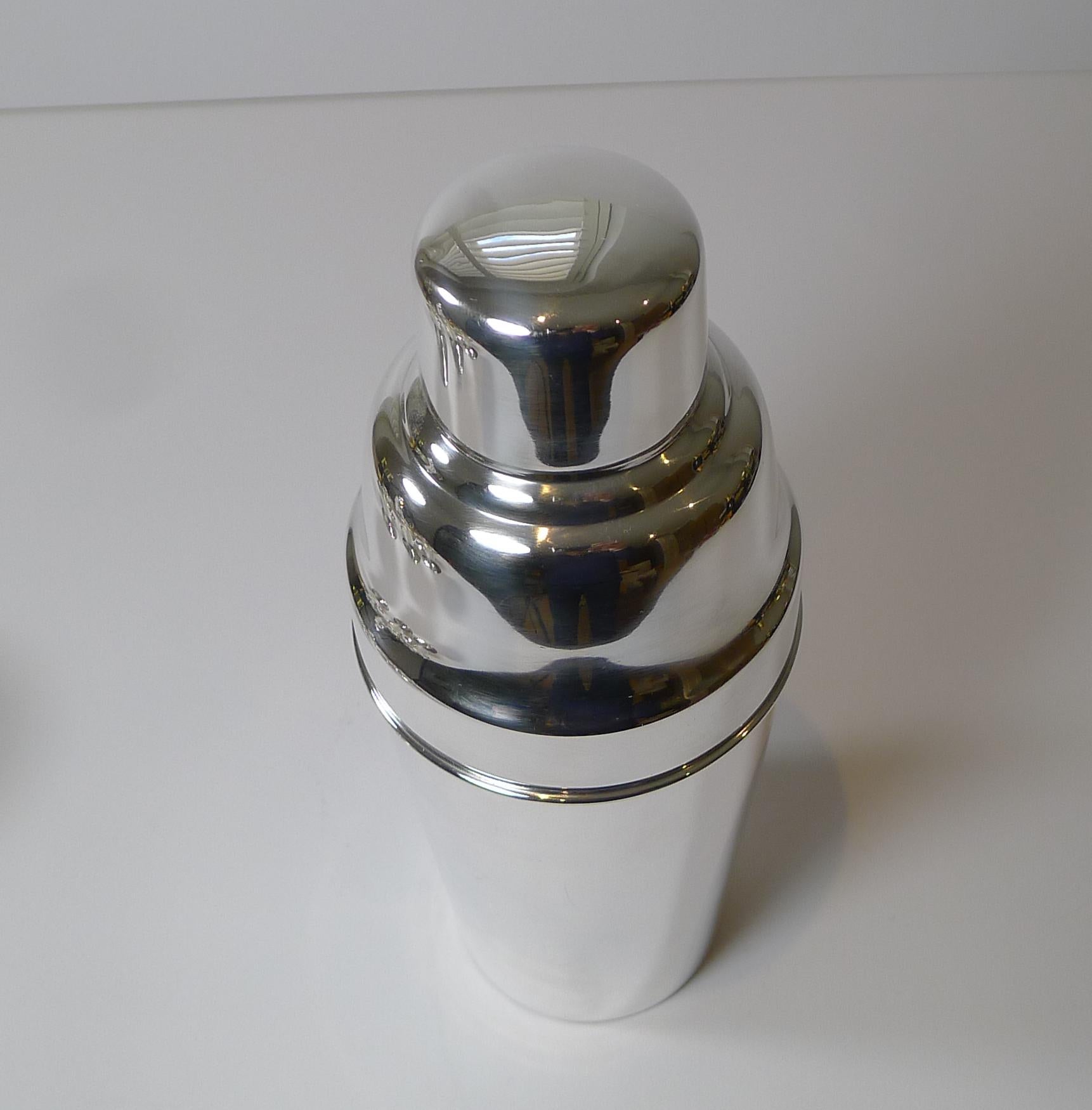 A smart, classic Art Deco cocktail shaker made by the top-notch silversmith, Mappin and Webb of London and Sheffield.

Just back from our silversmith's workshop where it has been professionally cleaned and polished, restoring it to it's former
