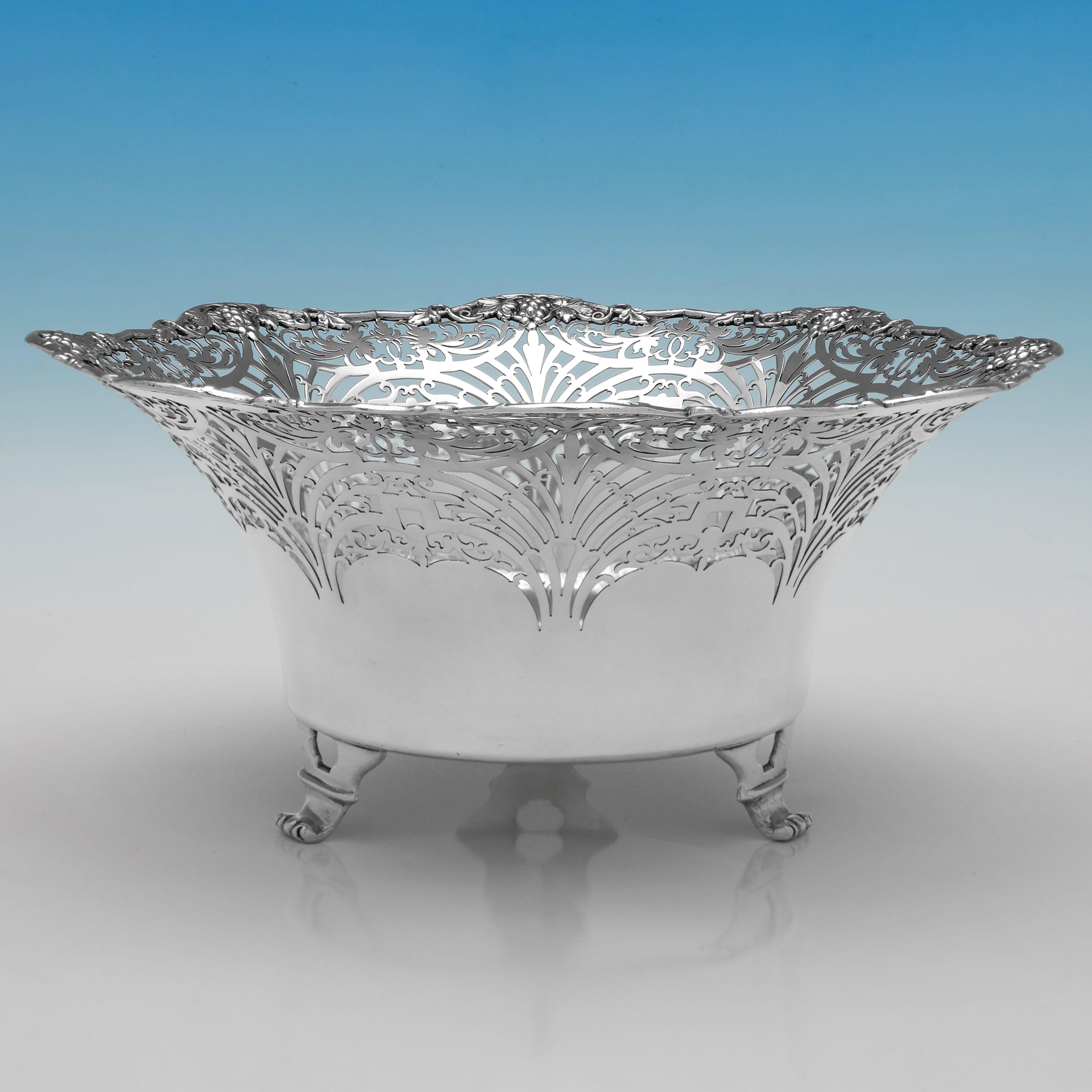 Hallmarked in Sheffield in 1942 by Mappin & Webb, this attractive, Sterling Silver Dish, features pierced decoration to the top half of the body, a grape and vine border, and stands on three feet. The dish measures 4.5