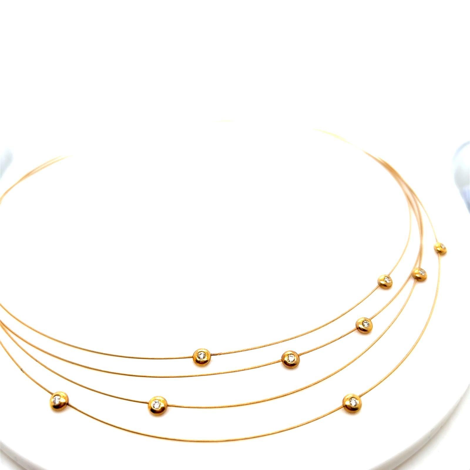 Mappin & Webb Diamant-Halskette mit mehreren Strängen aus 18 Karat Gelbgold

Diese Halskette besteht aus 4 Strängen, von denen jeder aus gedrehtem Golddraht besteht, um ein flexibles Finish zu erzielen.

Die Stränge sind mit Diamanten besetzt, die