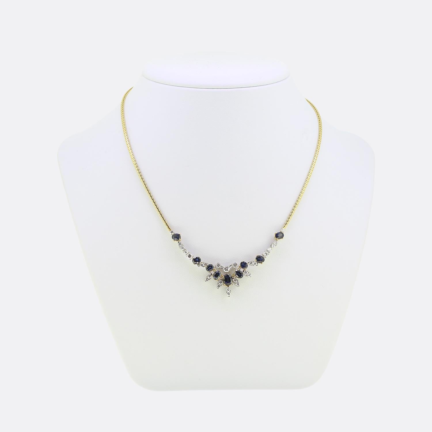 Here we have a wonderful necklace from the historic jewellery company of Mappin & Webb. A warm 18ct yellow gold rope-like chain suspends a fabulous ensemble of precious gemstones at the centre. Perfectly matched deep medium navy coloured oval