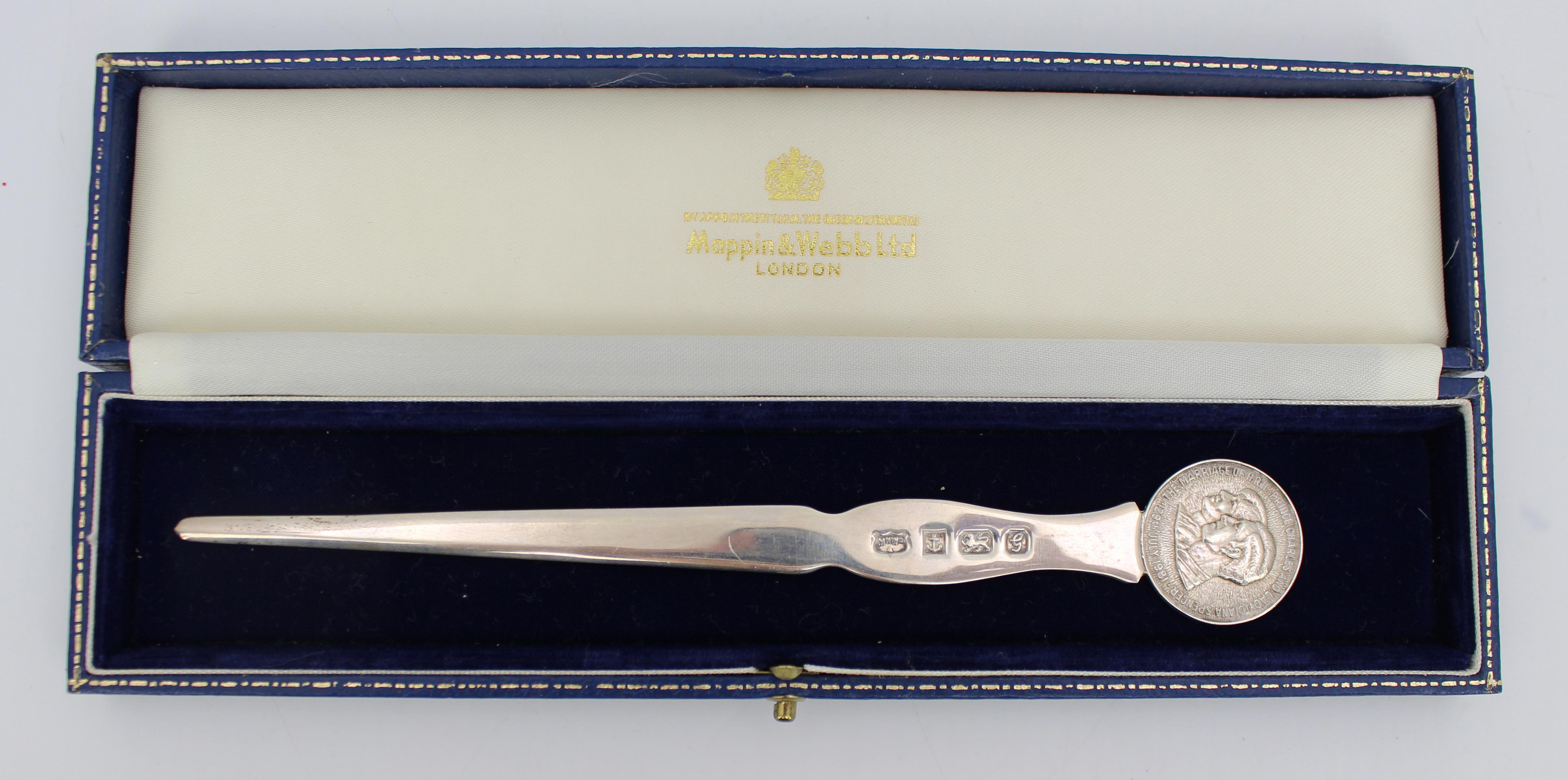 Mappin & Webb Solid Silver Royal Wedding Letter Opener, Boxed – 1981

A finely crafted solid sterling silver letter opener by esteemed British silversmiths Mappin & Webb, created to commemorate the marriage of HRH Prince Charles to Lady Diana