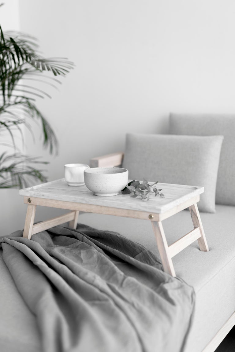 Composed of warm materials, the Mar Service Table with a solid wood structure and a matte finish marble cover adapts to any space providing a sense of service and hospitality. Production time: 6-8 weeks for items without marble / 13-14 weeks for