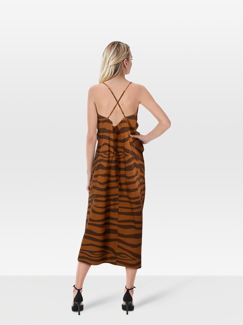 CONDITION is Very good. Minimal wear to the dress is evident. Discolouration on the lower front right of this used Mara Hoffman designer resale item.
 
 
 
 Details
 
 
 Brown
 
 Cotton
 
 Dress
 
 Zebra print
 
 Midi
 
 Sleeveless
 
 Front leg