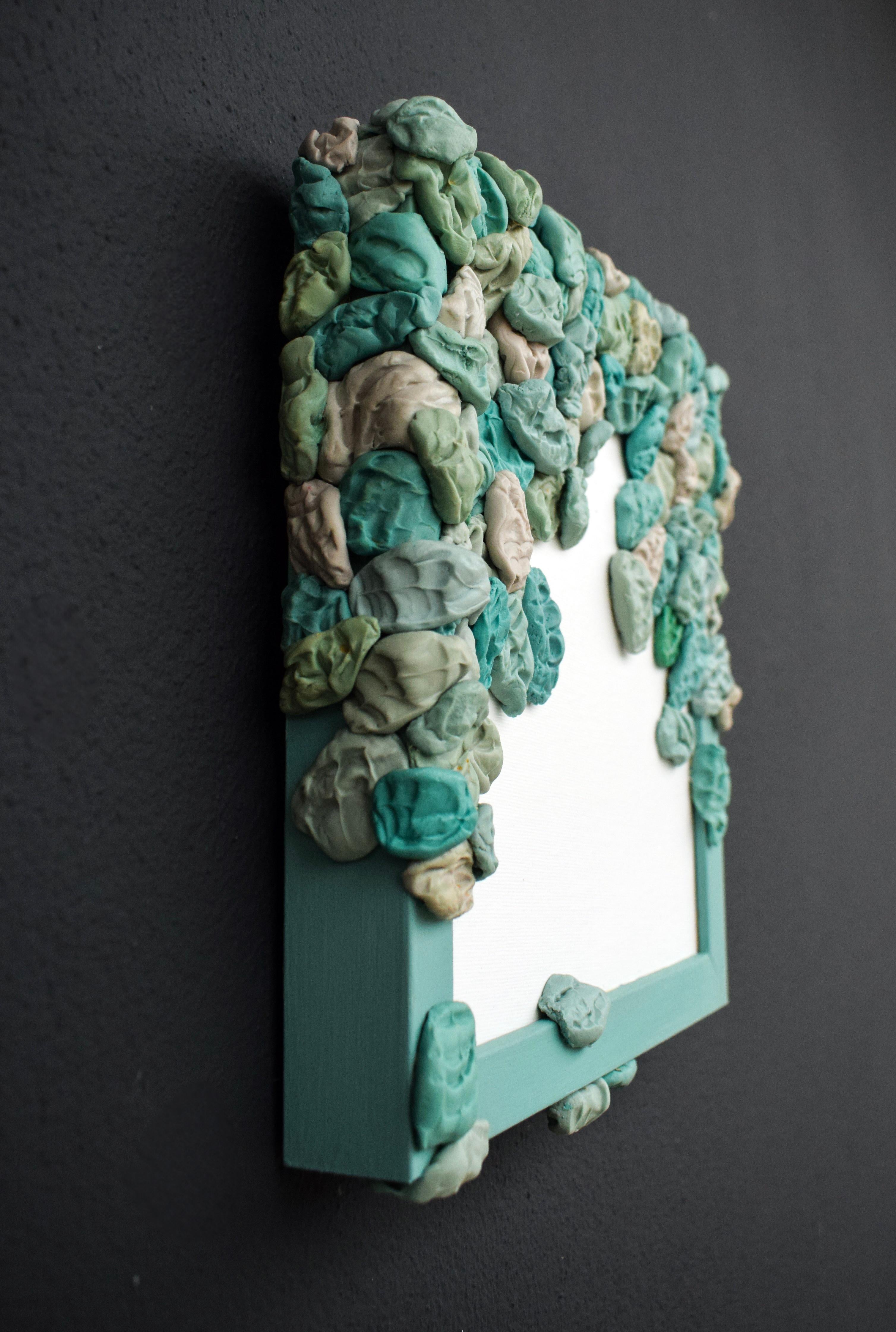 This wall-mounted pop object sculpture by María Magán features dozens of hand-molded chewing gum-like elements crafted in polyvinyl silicone, a material commonly used in dental practices for taking precise impressions due to its high fidelity and