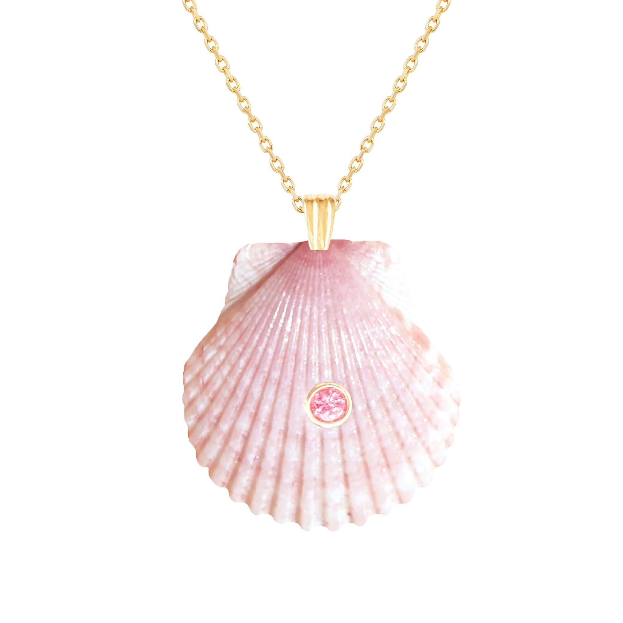 Natural shell pendant with solid 14k gold findings and natural pink tourmaline gemstone. Wear this pendant alone or layer it with other gold chains for a beautiful layered effect.  

Order includes one shell pendant, exactly as depicted in primary