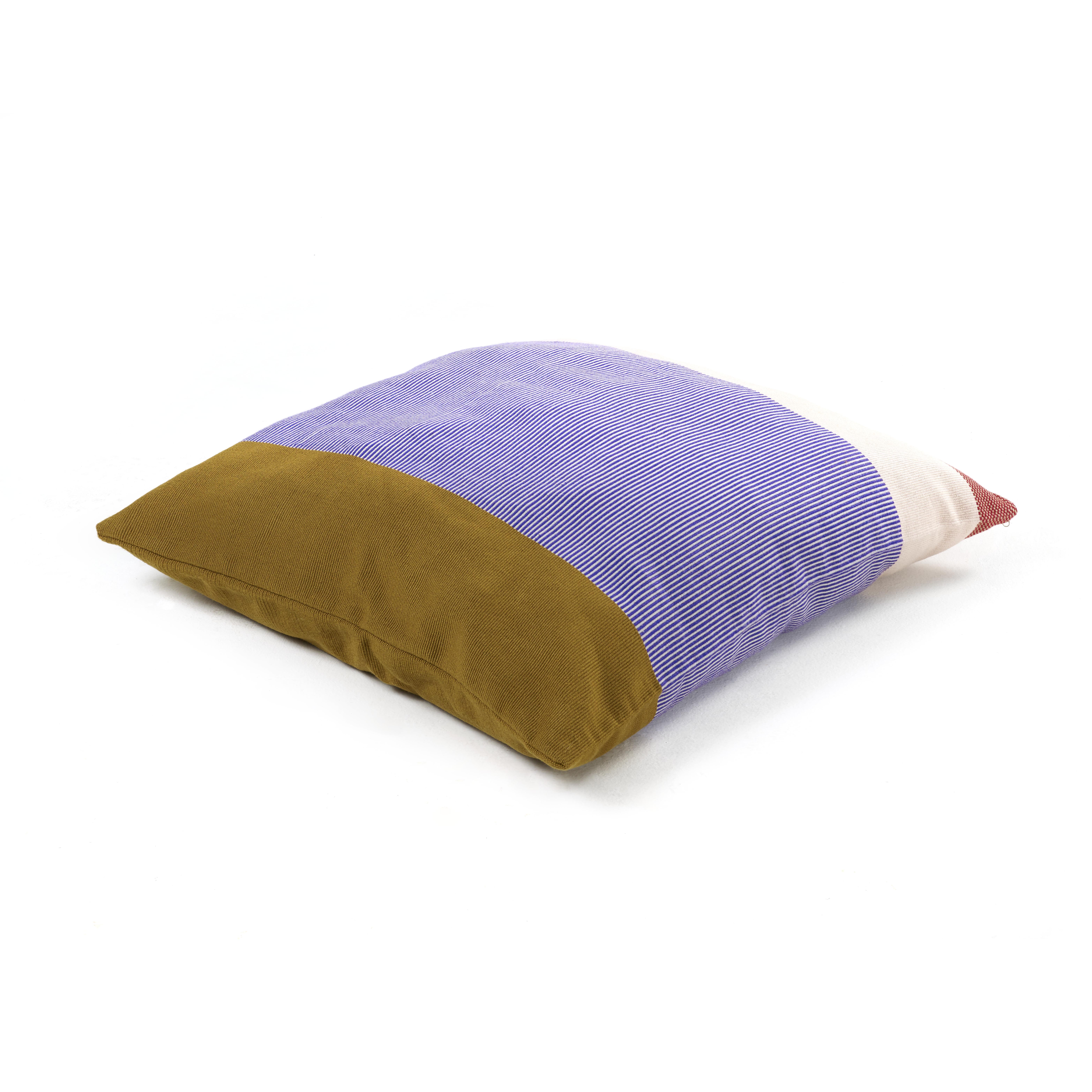 Maraca pillow 1 by Sebastian Herkner
Materials: 100% Cotton. 
Technique: Hand-woven in Colombia. 
Dimensions: W 50 x H 50 cm 
Available in colors: verde/ purpura/ rojo, naranja/ dorado/ rojo, dorado/ purpura/ rojo. 

With their strong