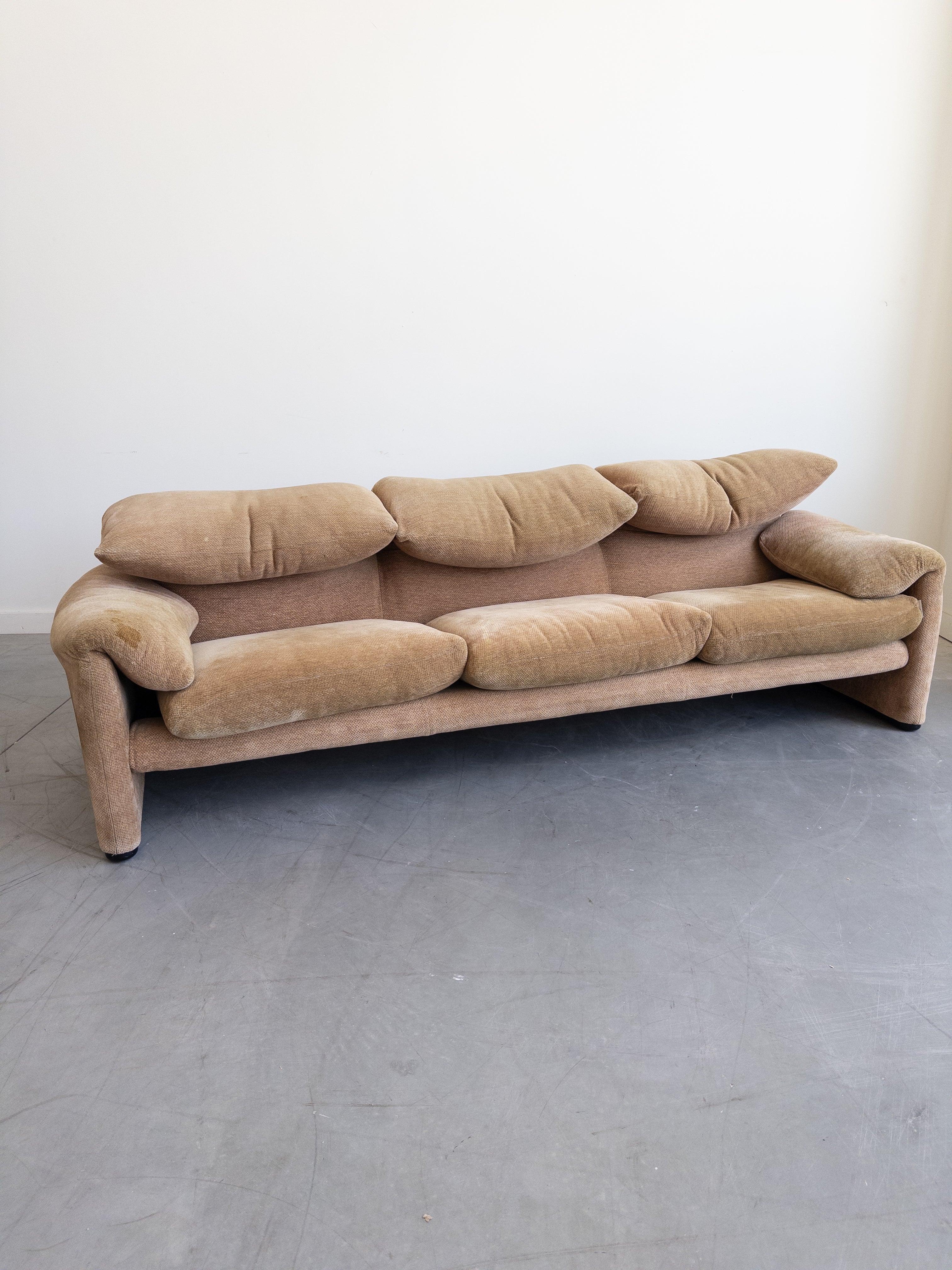 Maralunga 3-seater Sofa, designed 1973 by Vico Magistretti for Cassina. This sofa features folding back rests cushions that can be folded down, or folded up to provide the user with more upper back and neck support. In its original Beige Upholstery.