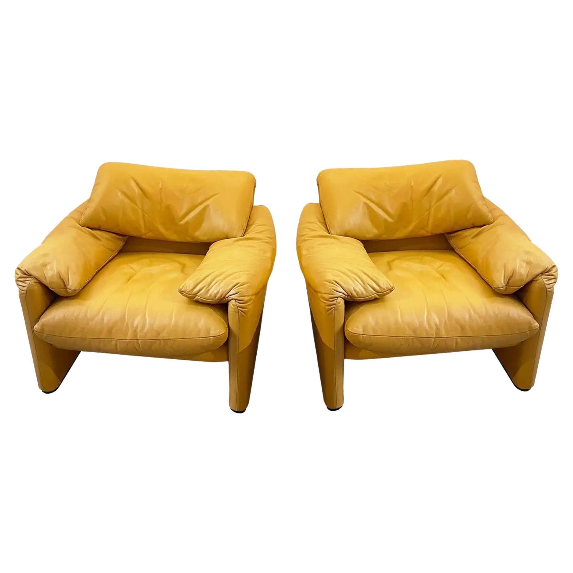 These Vico Magistretti Maralunga armchairs produced by Cassina epitomize a harmonious blend of ergonomic innovation, and enduring elegance. Designed by the visionary Italian designer, these armchairs are a celebration of comfort, style, and the art