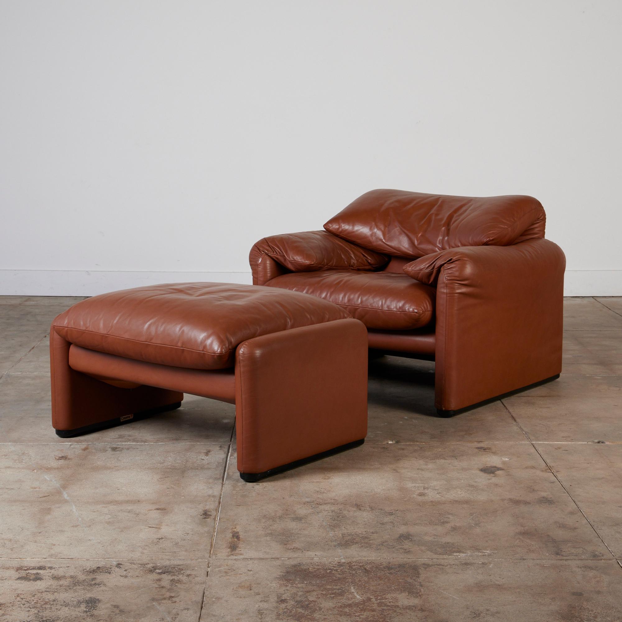 Designed in 1973, the Maralunga collection by Vico Magistretti for Cassina, features a backrest of unique comfort and adjustability with rich, chocolate brown leather. The wire structure - the result of a happy accident during the prototyping