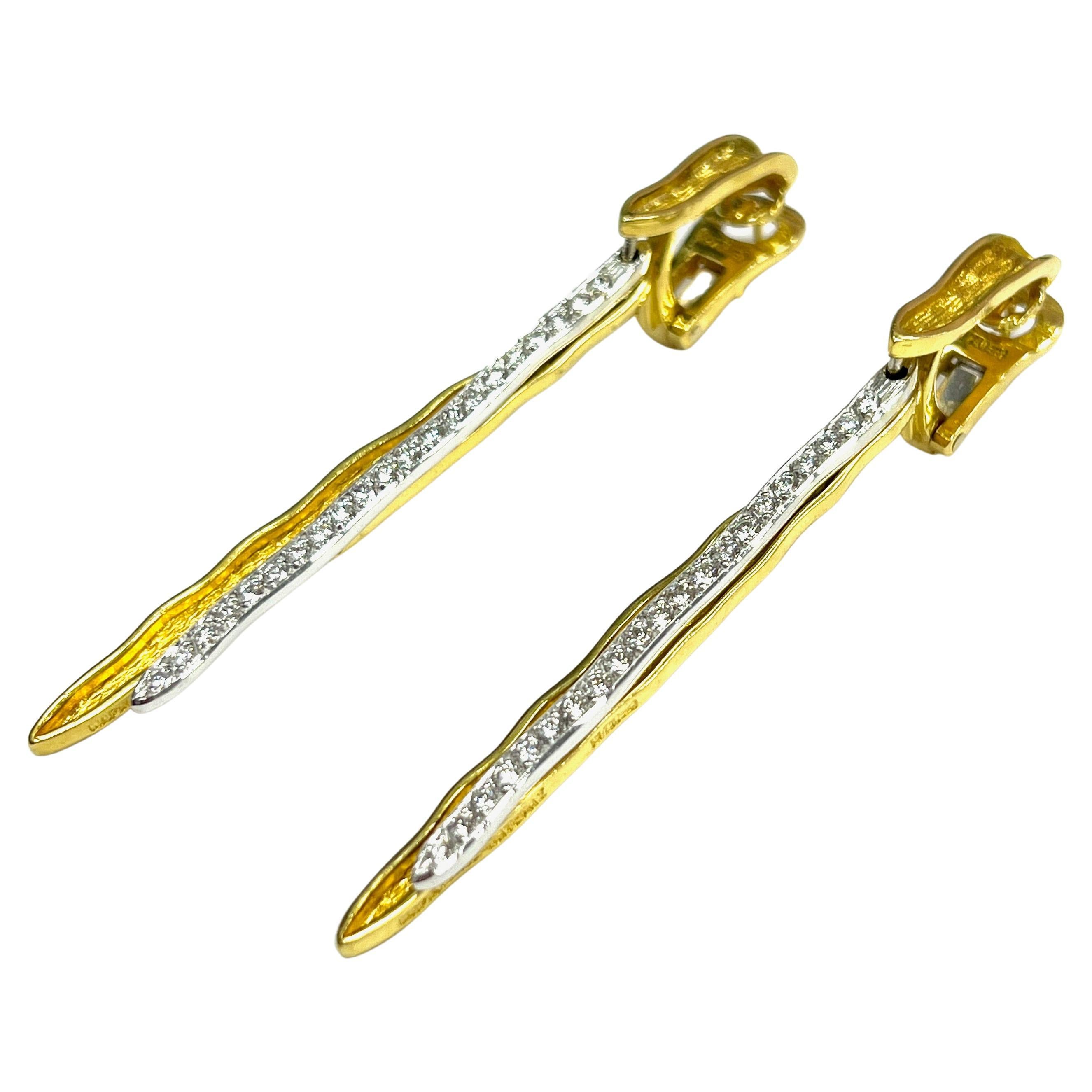 Maramenos & Pateras Icicle Diamond Yellow Gold Earrings

Forty-two round brilliant cut diamonds of approximately 0.84 carats total, with VS2 clarity and H color; set on 18 karat yellow gold; marked Maramenos & Pateras, 750

Size: width 0.25 inch,