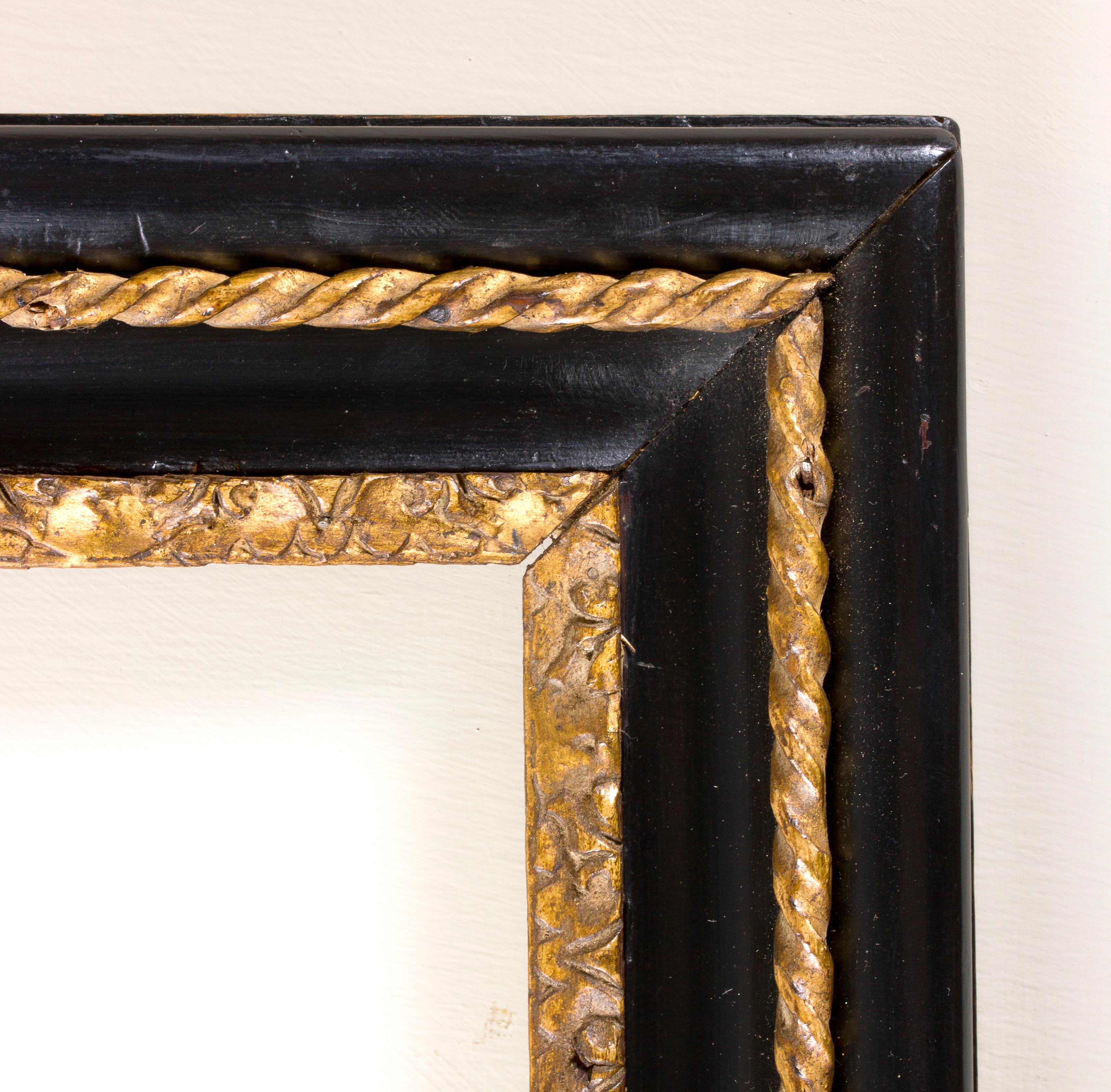 Maratta frame, Italy, 18th century
Golden, ebonized and carved wooden frame.
Inside: 24.3 x 18 cm; outside: 34.5 x 28.2 cm.
Depth is the wide of the band.
 