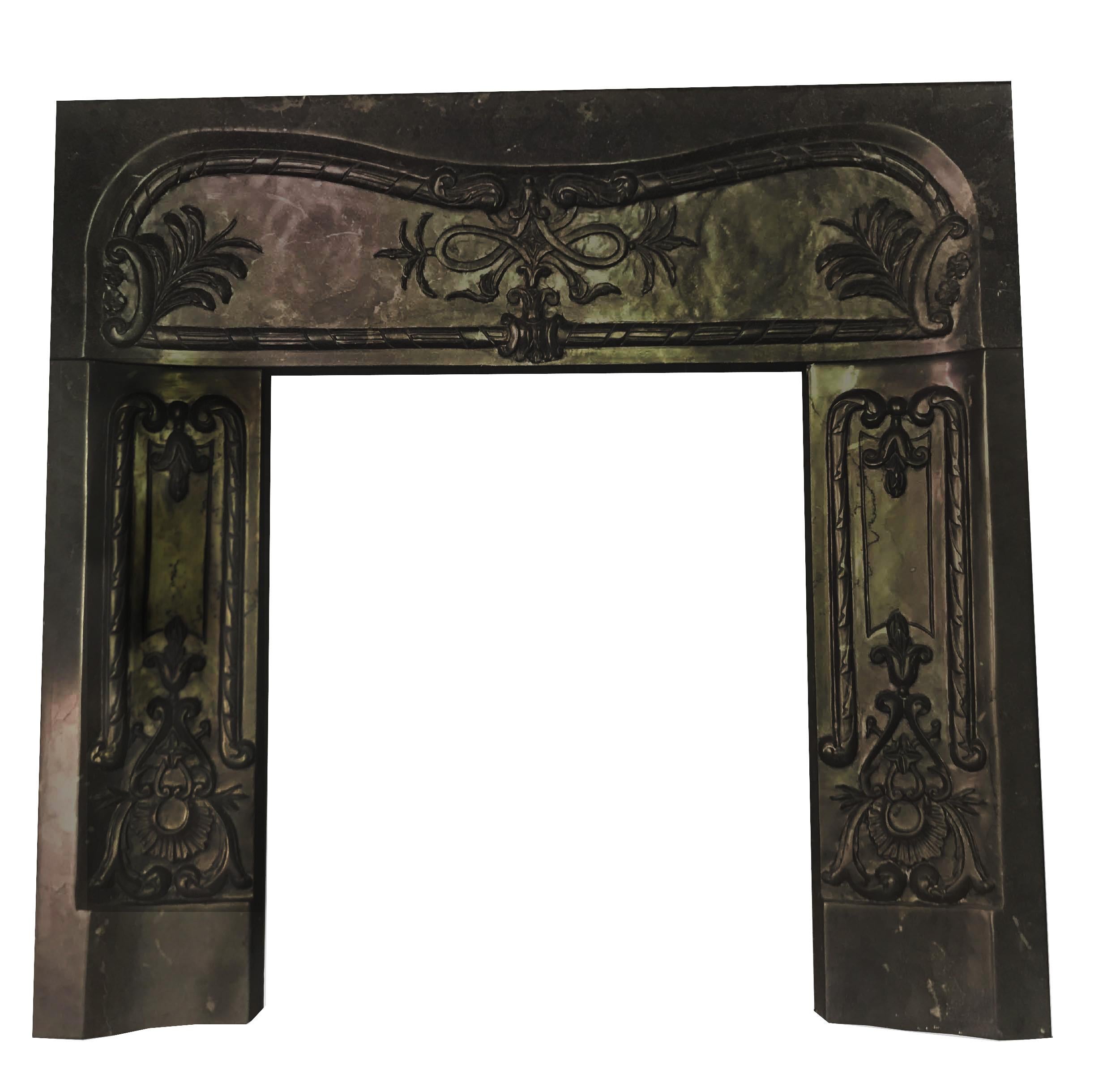 Marble 19th century fireplace mantel in black absolute marble with carved decorative details. Mantel (fireplace) comes in three pieces. Measures: Legs are H 26