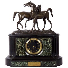 Marble and Black Slate Mantel Clock with Equestrian Sculpture Group, circa 1865