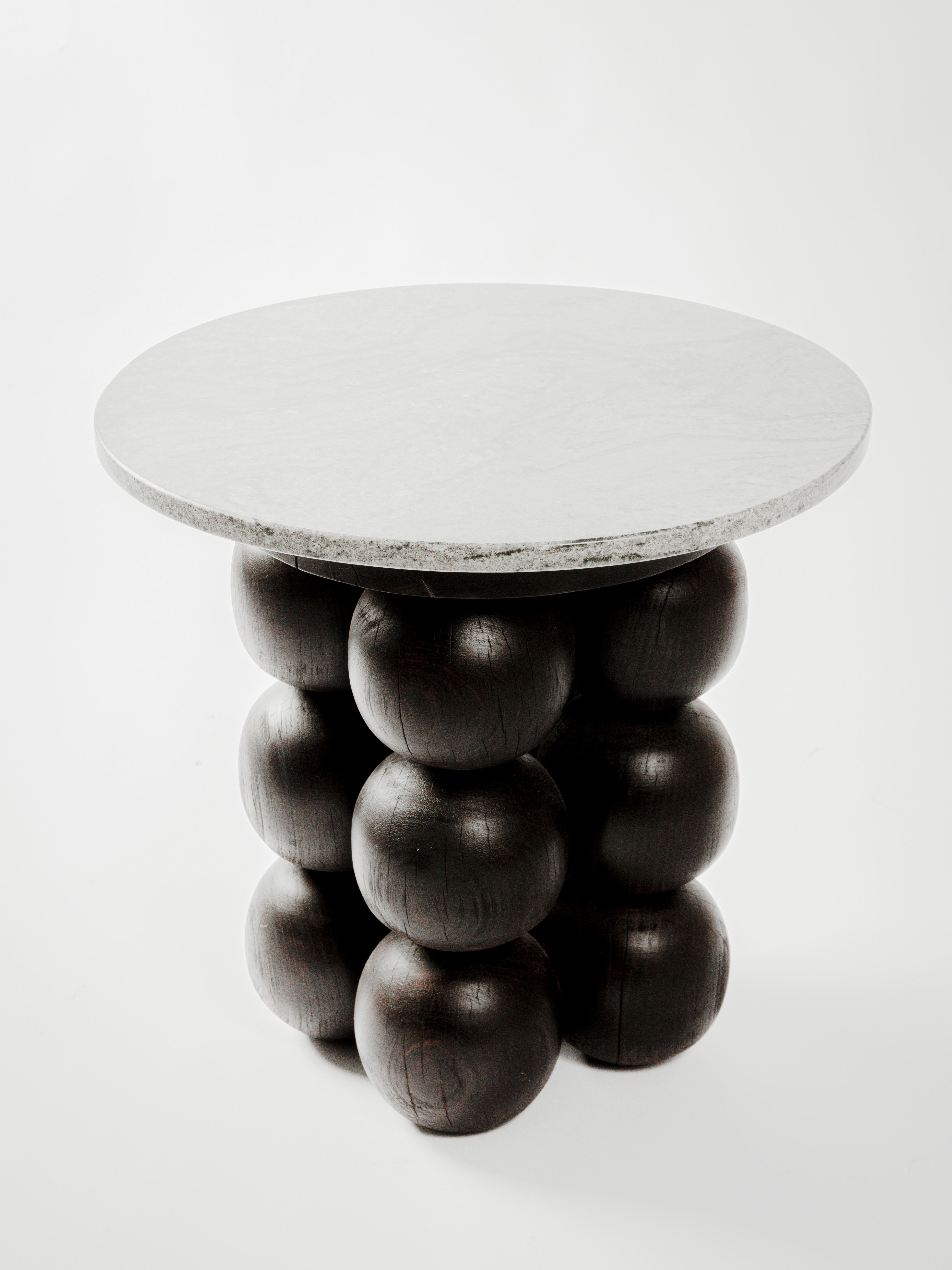 Marble and Black Wood Totem Side Table by Daniel Orozco
Material: Solid wood, Marble
Dimensions: D 60 x H 57 cm

Marble cover table and 3 ball legs with black finish. Handmade by Mexican artisans.

Daniel Orozco Estudio
We are an inclusive interior