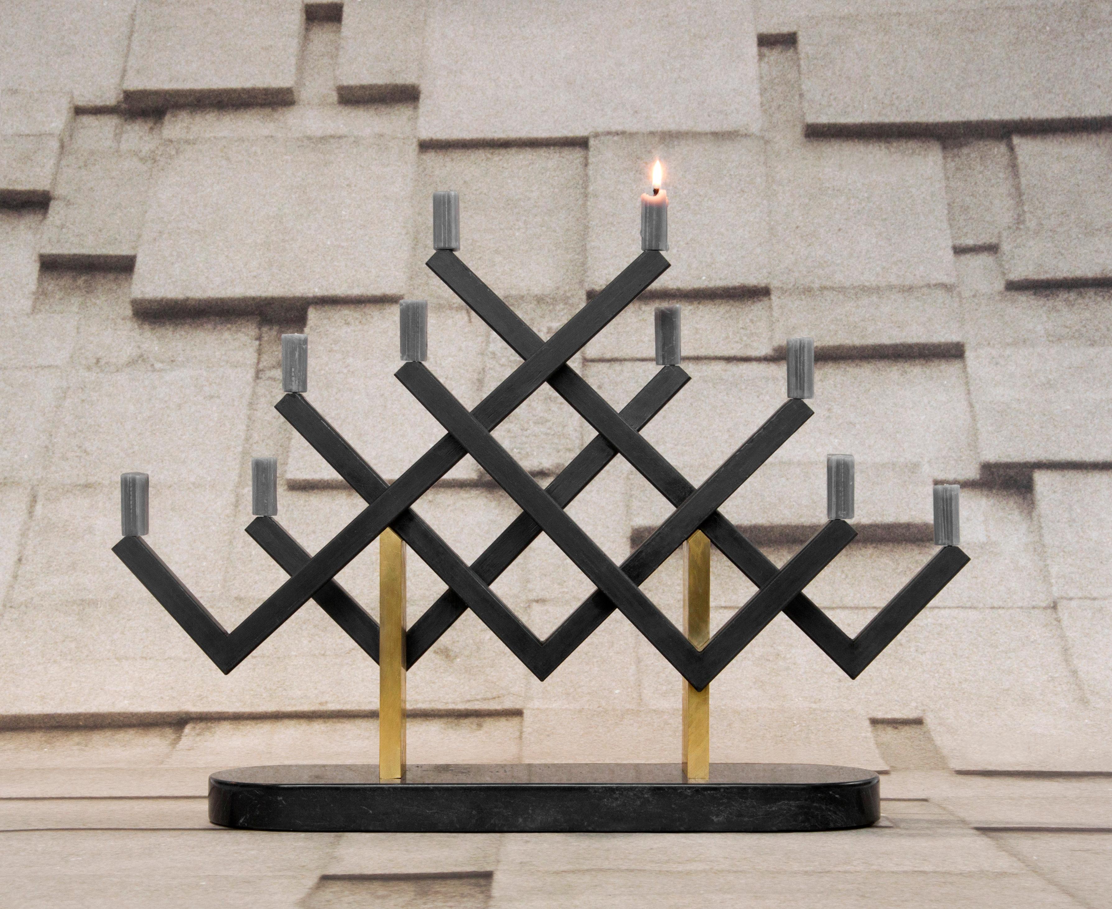 Cancello candelabra by Oeuffice
Edition: 12 + 2AP
2013
Dimensions: 60 x 13 x 44 cm
Materials: Black oxide steel, solid brass, black marble of ormea

The structure of this candelabra represents an extract of the many elegant and elaborate