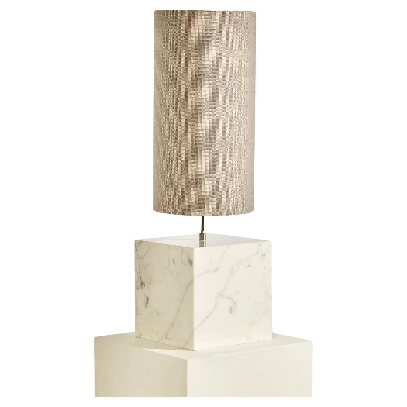 The Coexist Table Lamp is the outcome of a thoughtful design procedure that gives a new lifecycle to exquisite materials in a bold and unique way. The lamp is made entirely of recycled and long-lasting materials - the handcrafted marble base is